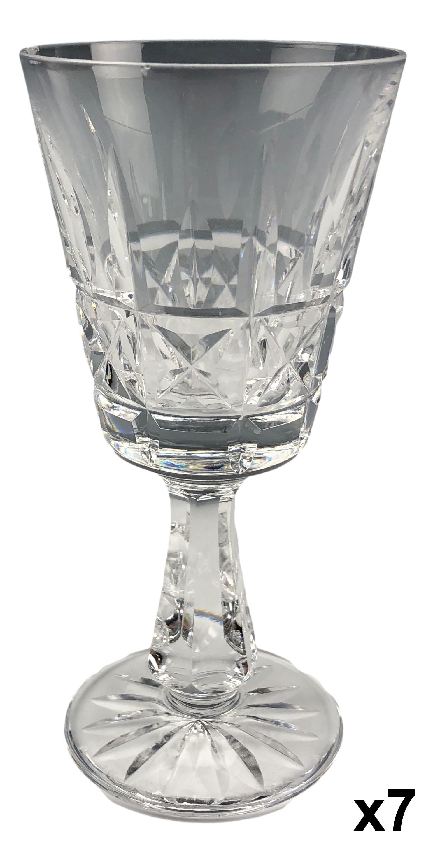 7 Waterford Crystal "Kylemore" Claret Wine Goblets: Clear cut crystal art glass bar barware wine goblets. Pattern Kylemore introduced in 1966. Discontinued / retired in 2017. Design features vertical cuts over a diamond quilted body. Tapered multi side