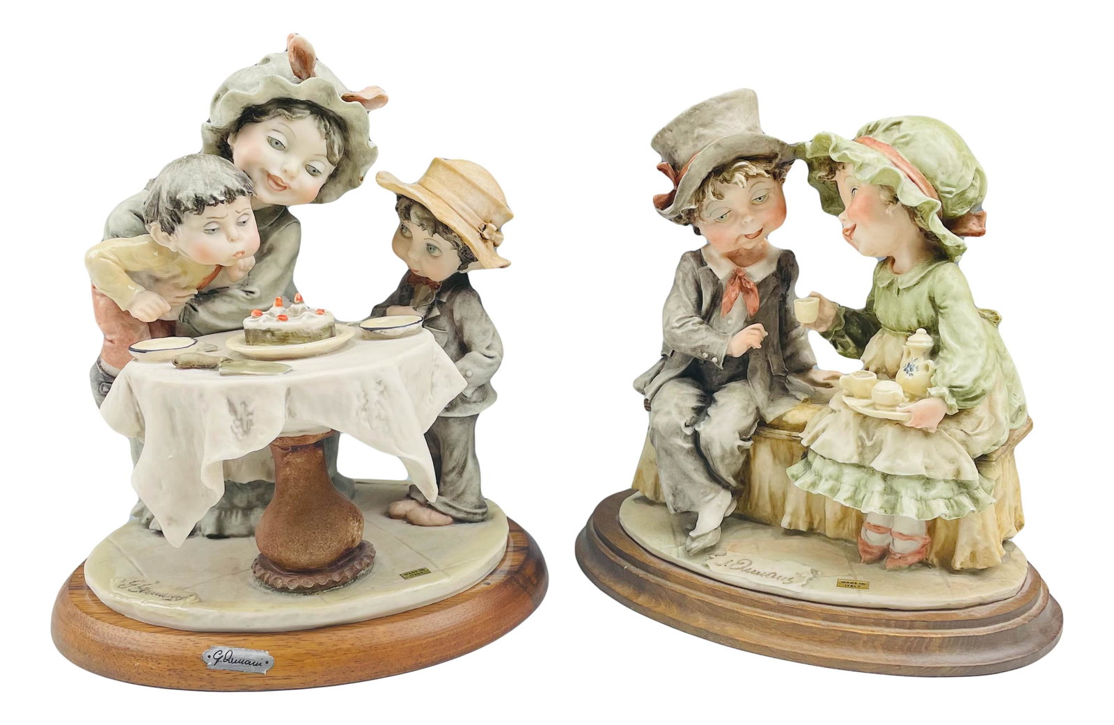 2 Giuseppe Armani (1935-2006) Children Sculptures: Giuseppe Armani ( Italian, 1935 - 2006 ) celebrated sculptor and artist. Known for his detailed and intricate figural creations. One features two young children seated on a bench, enjoying hot tea. Th