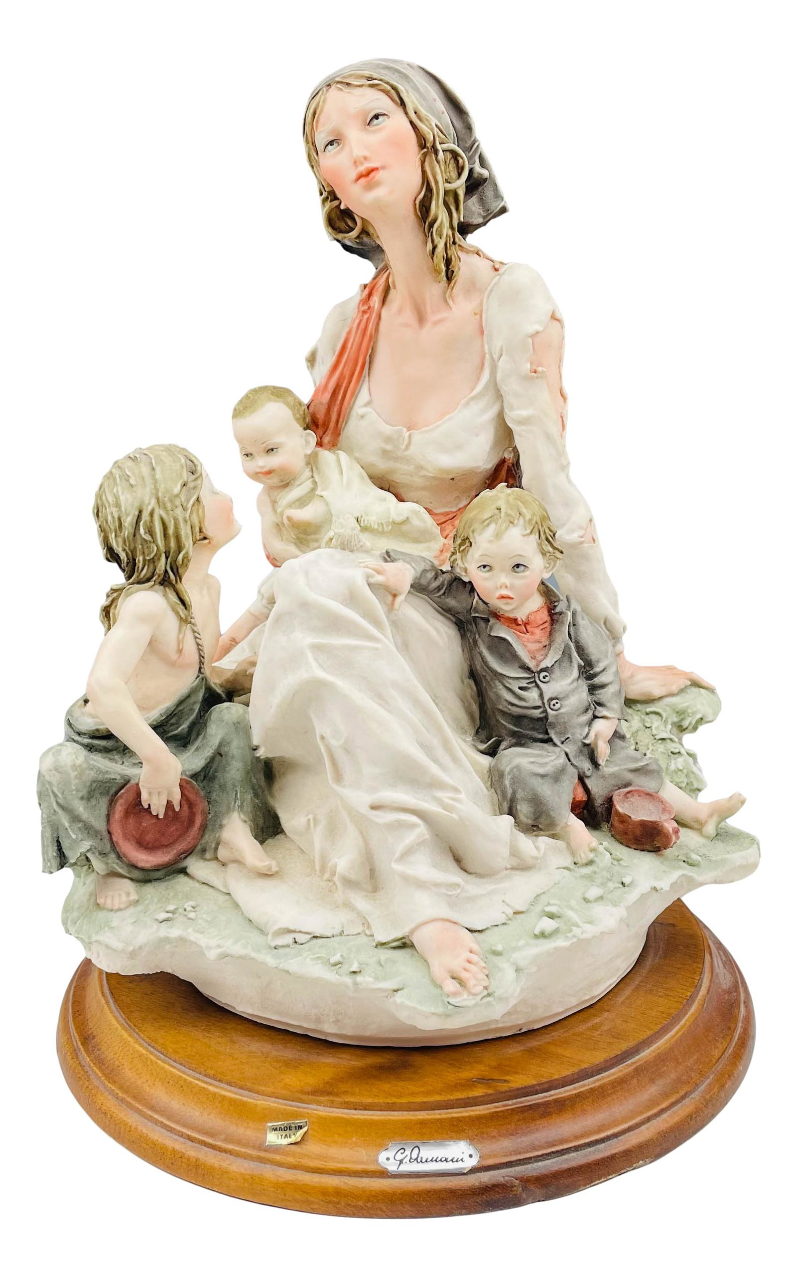 Giuseppe Armani Gypsy Mother w Children Sculpture: Giuseppe Armani ( Italian, 1935 - 2006 ) celebrated sculptor and artist. Known for his detailed and intricate figural creations. Subject matter features a seated gypsy mother with her children. Mounte