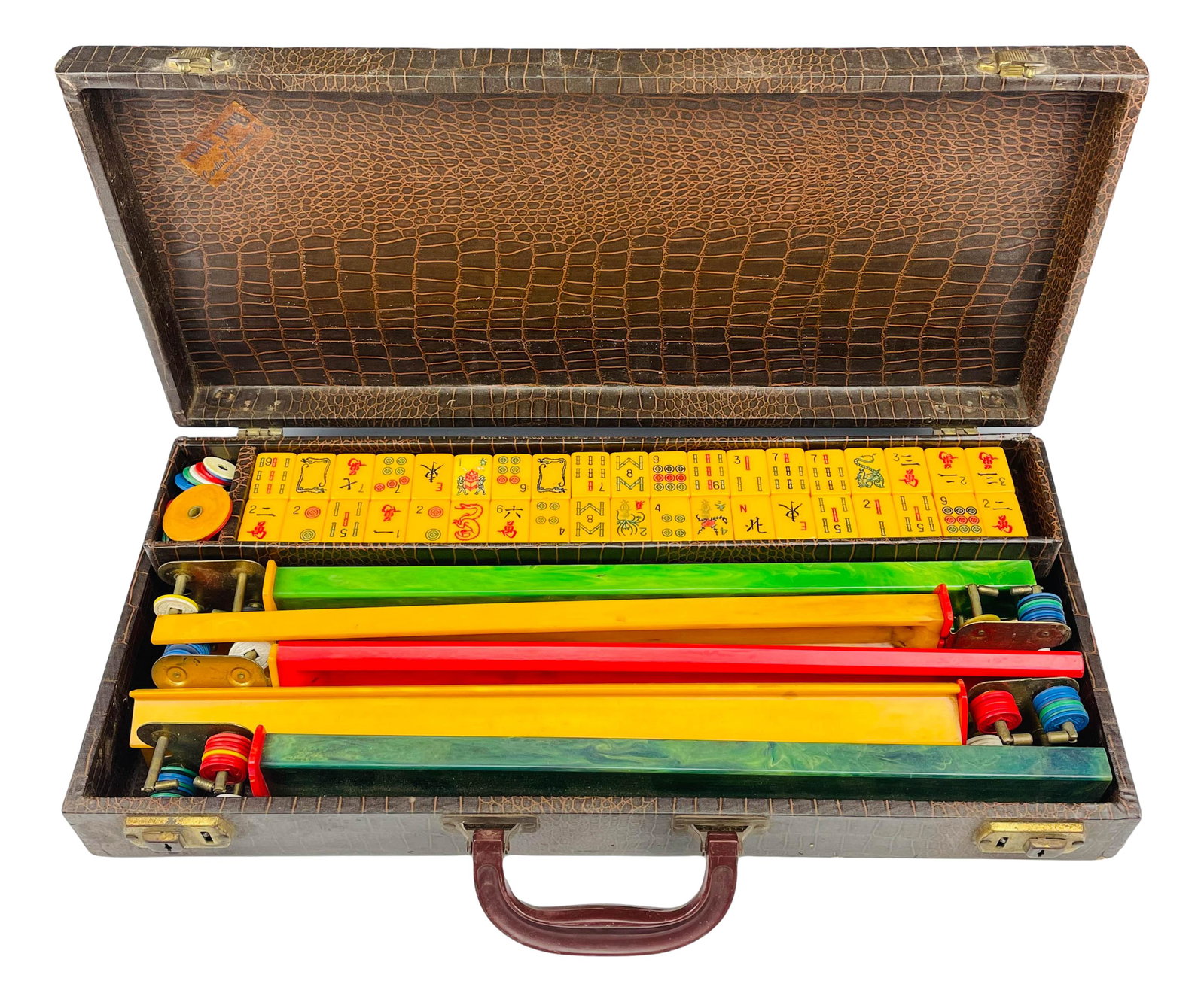 Mahjong 152 Bakelite Tile 5 Rack Board Game w Case: Includes a total of 152 egg yolk butterscotch bakelite tiles, 5 colored racks and 2 small dice. All housed in a leather covered hard cased carry box. Tile measure 1 1/4" x 7/8" x 1/2". Racks measure 1