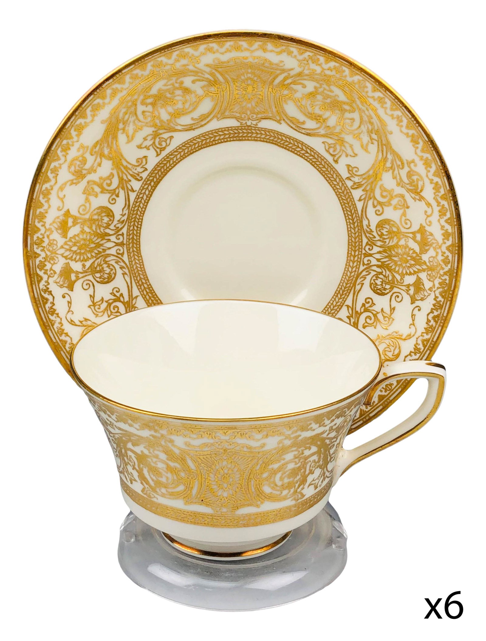 Royal Worcester Embassy Cup w/ Saucer Set 6 pc LOT: 20th century English bone china dinner plates modeled in the "Embassy" pattern by Royal Worcester. Each features raised relief ornate gold filigree decorations around the border against a cream ground