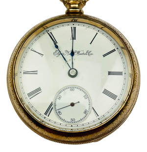 Elgin National Watch Co Gold Filled Pocket Watch: The Elgin National Watch Company commonly known as the Elgin Watch Company was a major US watchmaker from 1864 - 1968. Features black roman markers on a white enamel dial face with a sub dial at the 6