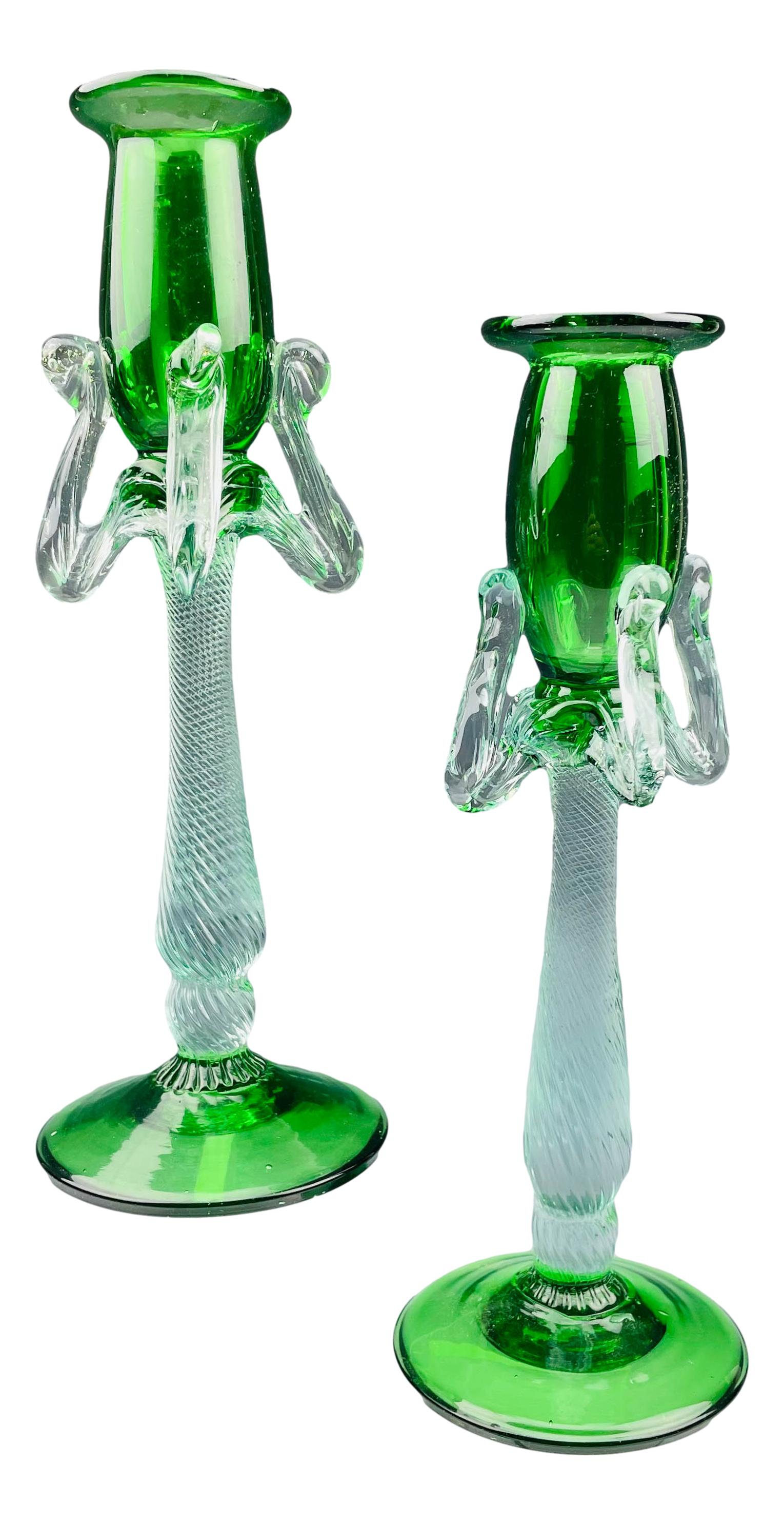 Green Clear Murano Style Art Glass Candle Holder Pr: 20th century studio hand blown art glass shelf mantle Candle Holders. Features emerald green cup holder forms with spreading circular bases. Clear applied glass accents around, the tapered stems with