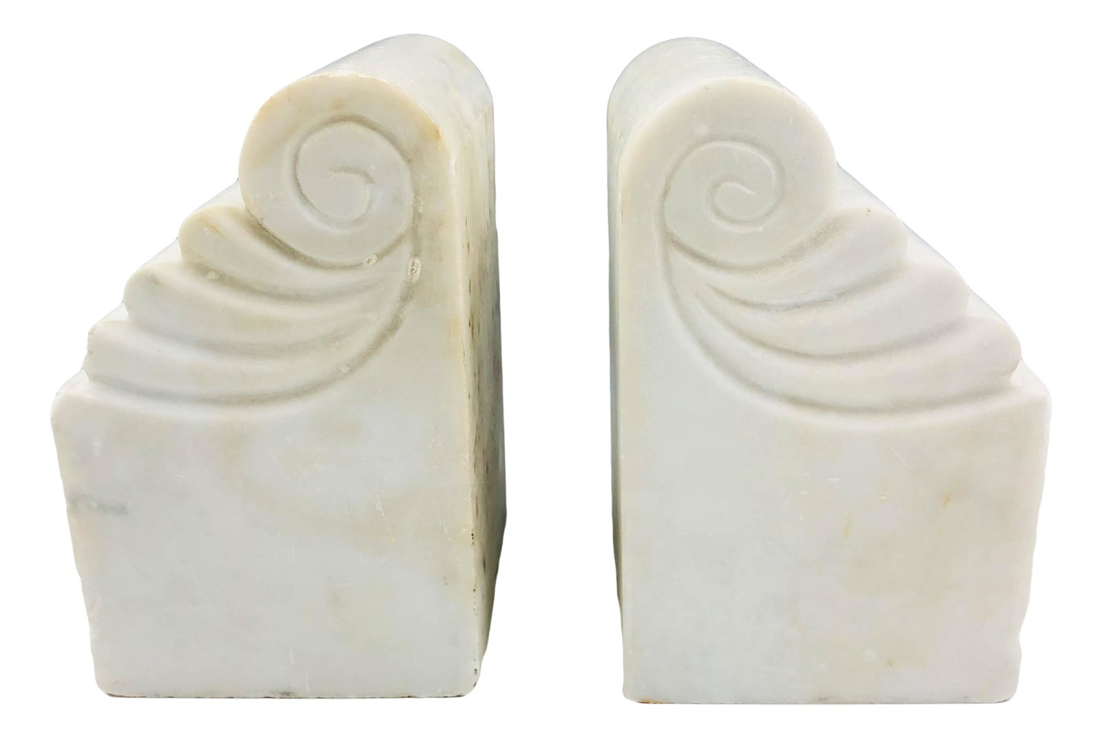 Mid Century Modern Carved White Marble Bookends: Pair of mid century modern bookends. Carved out of white grey marble. Carved VI and IV on sides of bookends. Dimensions: 7 X 4.5 X 5 in. Condition: Fair to good condition having average wear and