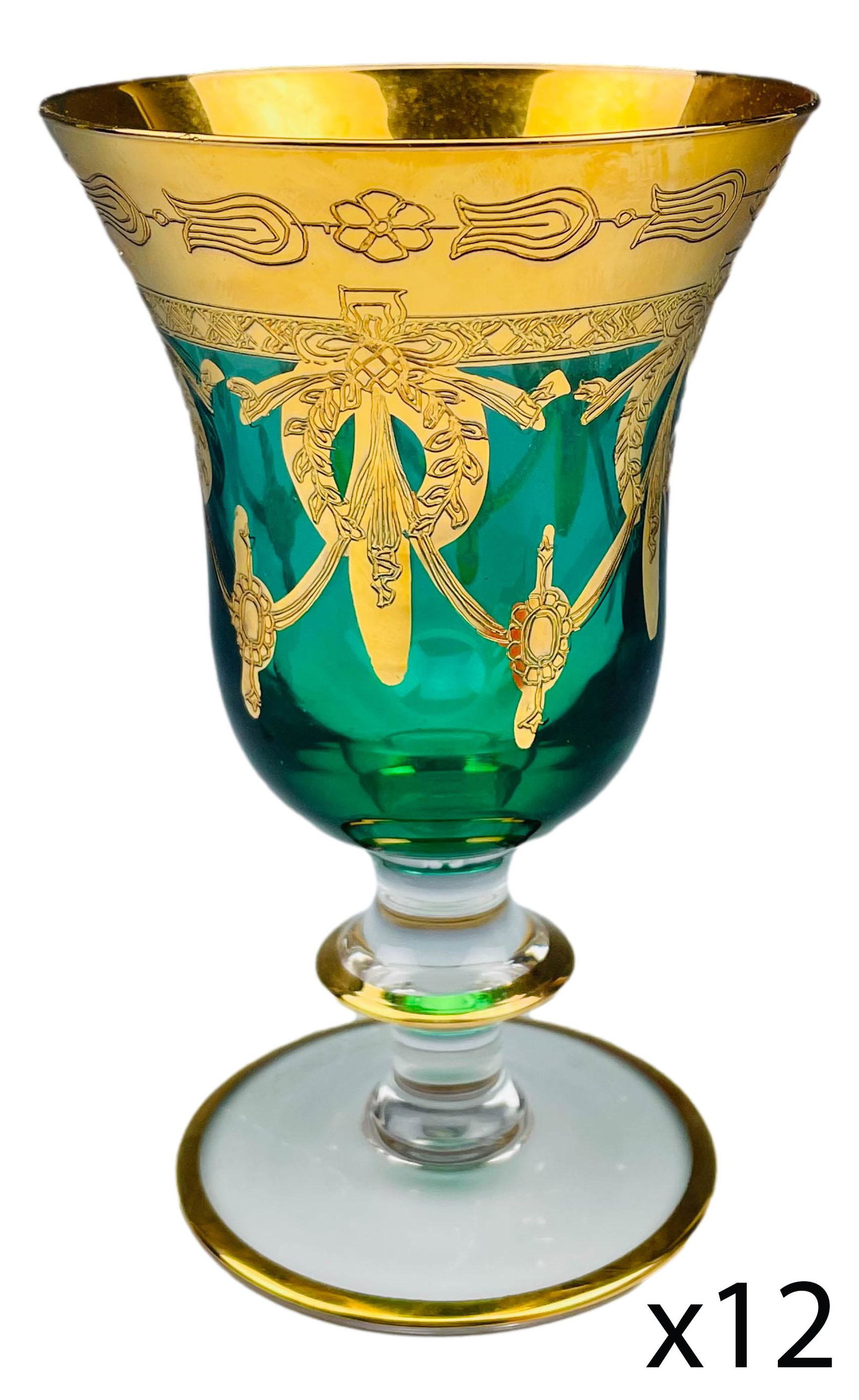 Bohemian Emerald Green Gold Gilt Water Goblet x 12: 20th century European origin studio Handcrafted glass goblets. The emerald green body graced with ornate and lavish gold decorated designs. Rims around the knob stems and the base trimmed with matchin