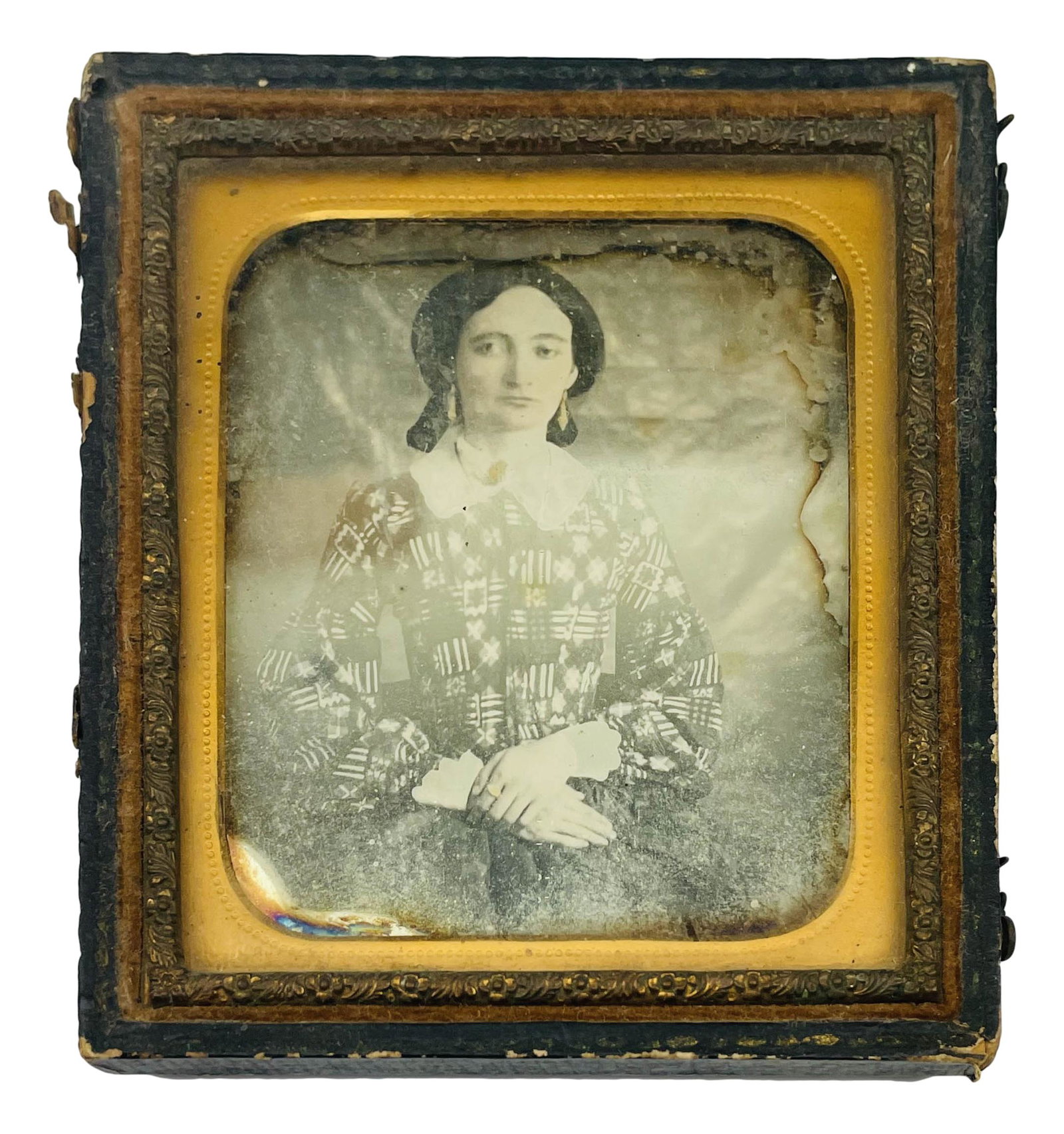 Antique Civil War Era Daguerreotype Ambrotype x 2: One encased in a hard cover thermoplastic case with raised decorations on opposite sides, the inside having a maroon cushion on one side, the other advertising the Union case. The other features a bla