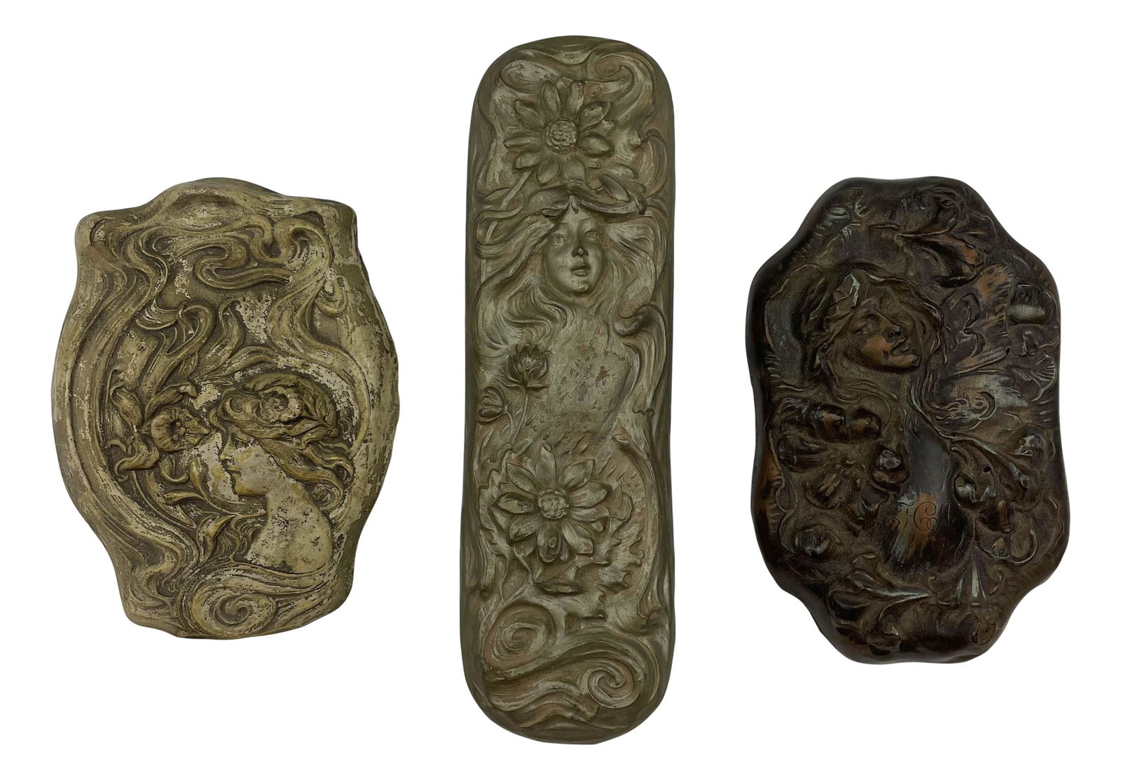 Antique Art Nouveau Maiden Floral Ceramic Plaques: Each depicts the face of a fair skinned maiden with floral and scroll decorations executed with a raised high 3 dimensional design. Original wire hooks on the back of each for easy wall mount. Measure