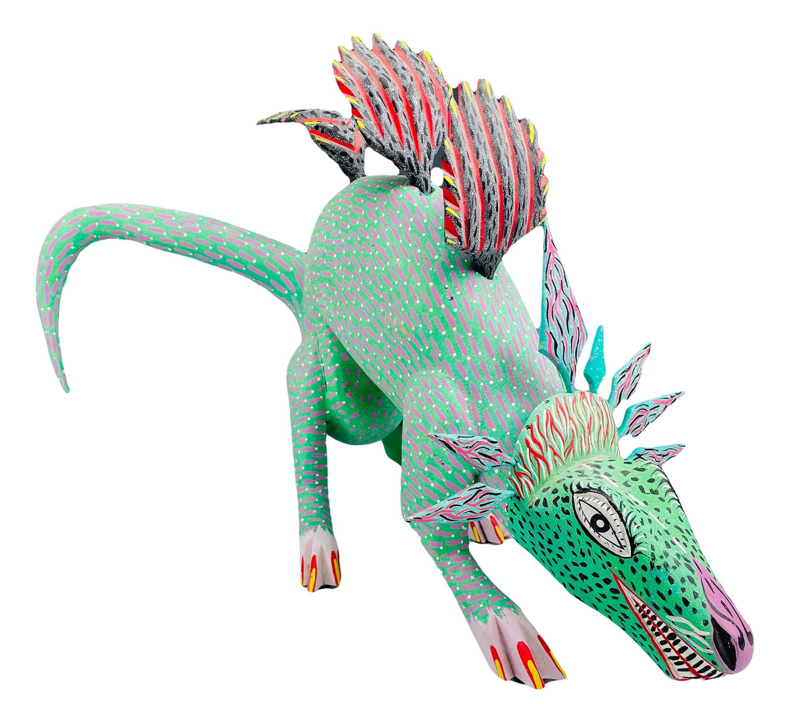 Oaxaca Mexico Carved Wood Folk Art Sculpture 20": Hand painted and Handcrafted carved wooden sculpture of Latin American cultural folk art. Depicts a lizard style reptile with a green body with pink, white and black accents with pink feet and red and