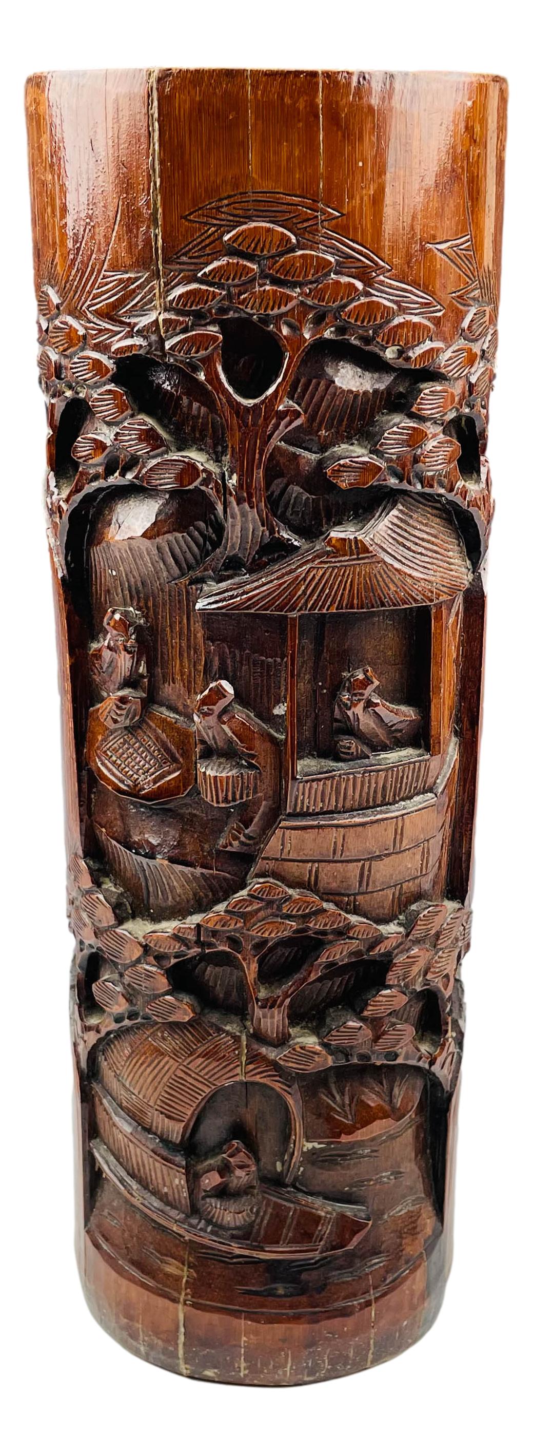 Chinese Wood Figural Scholars 14" Umbrella Holder: Chinese umbrella holder. Hand carved wood featuring a landscape scene with figural scholars. Dimensions: 14.5 X 5 X 4 in. Condition: Good overall condition with minor wear. Estate fresh to market