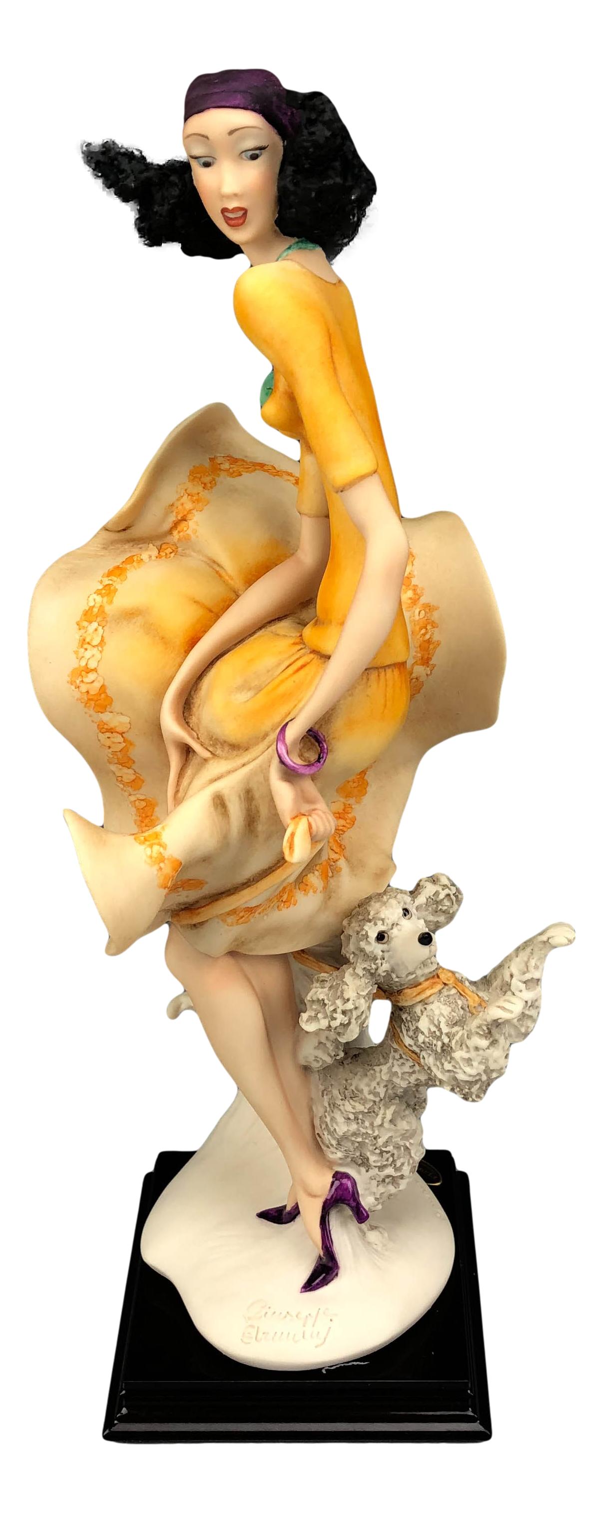 Armani Playful Dog 2108C Lady w K9 Puppy Figurine: Giuseppe Armani ( Italian, 1935 - 2006 ). Celebrated and internationally respected artist / designer and sculptor. Titled : Playful Puppy #2108C. Open Edition made available in 2007 to members only. M