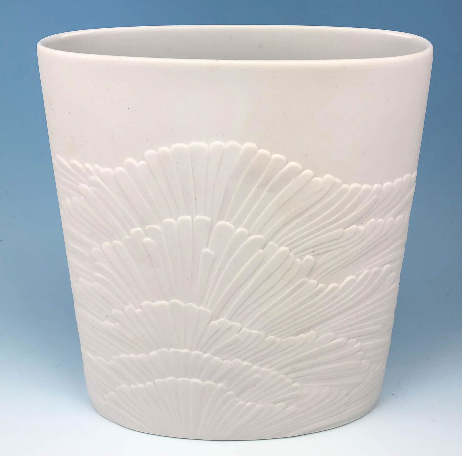 Rosenthal Mid Century Modern Bisque Porcelain Vase: White bisque Porcelain mid century Porcelain vase designed by Rosemunde Nairac for Rosenthal, Germany. Circa 1970's. Graced with a raised relief coral fern motif on opposite sides. Interior with a gla