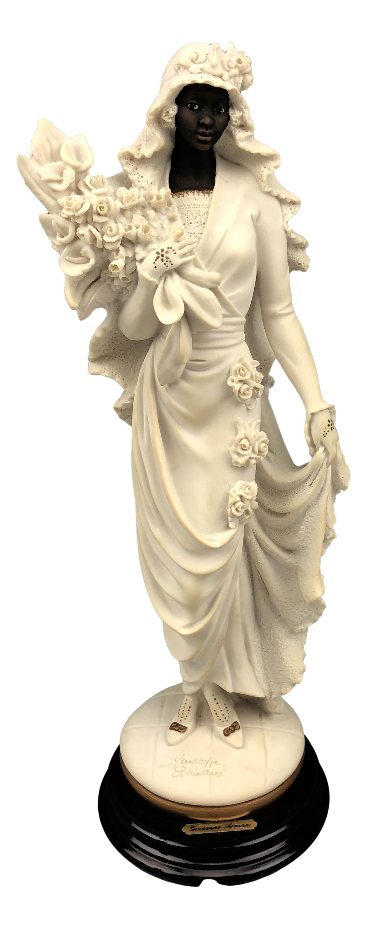Armani Italy African American Bride #500C Figurine: Giuseppe Armani ( Italian, 1935 - 2006 ). Celebrated and internationally respected artist / designer and sculptor. Titled African American Bride #500C. Depicts a black woman in a stunning wedding gown