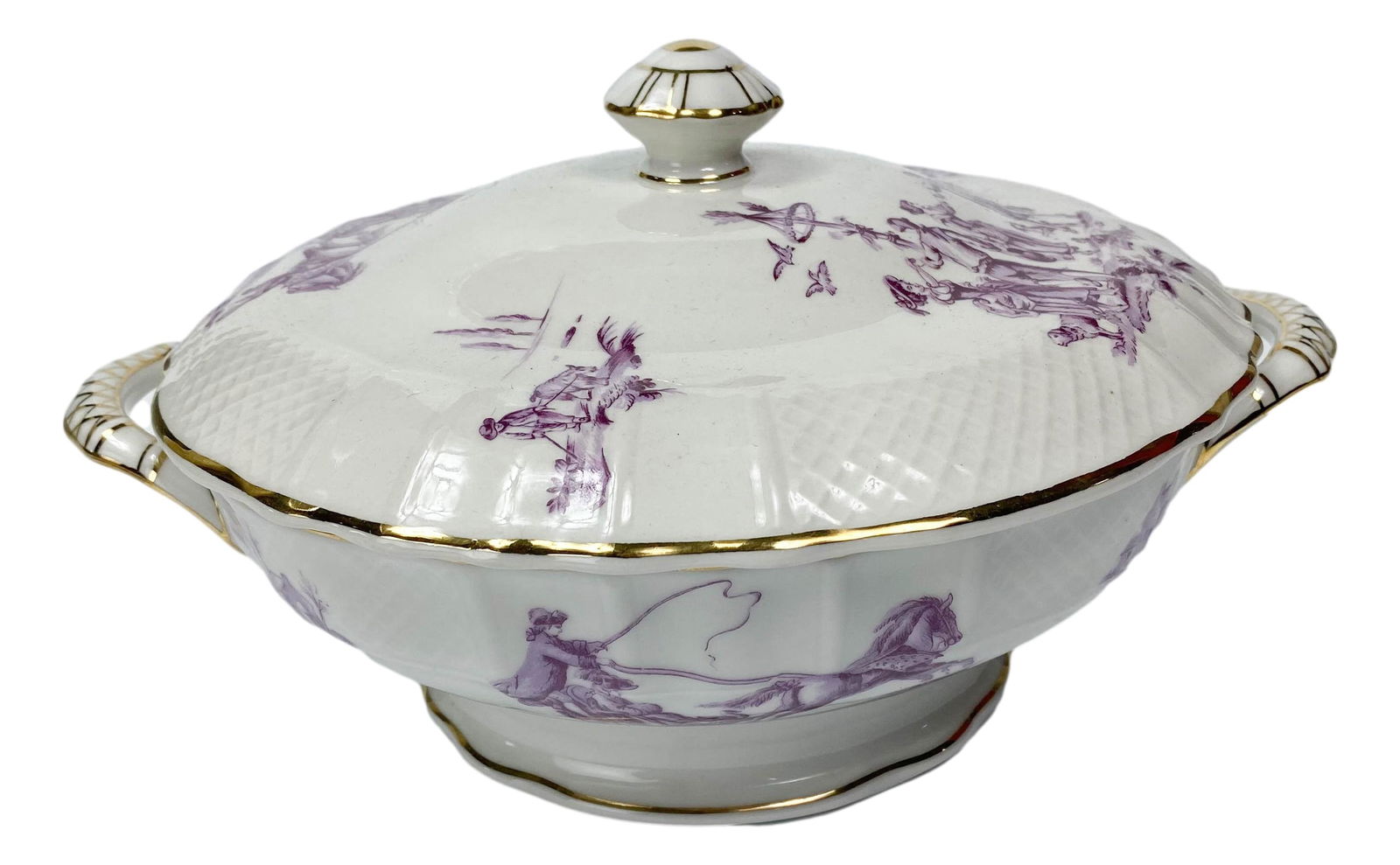 Limoges Bernardaud Co Porcelain Meat Casserole Lid: 20th Century French Porcelain. Graced with a figural groupings, birds, floral designs and castle ruins against a white ground with gold trim lining around the border to both. Measures 6 1/4" x 9 1/8".