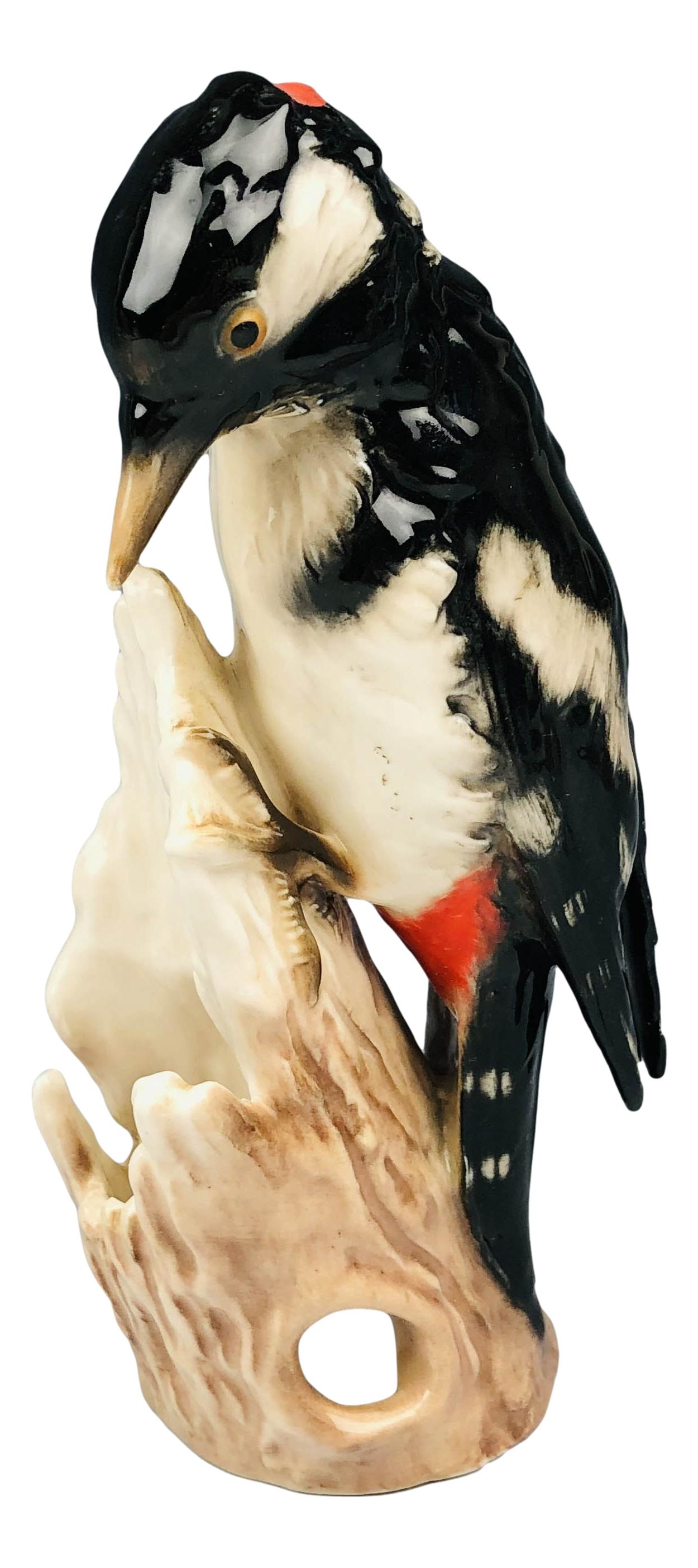 Goebel Great Spotted Woodpecker Pic Bigarre: W Goebel Great Spotted Woodpecker Pic Bigarre. Features a 1972 - 1979 W. Goebel great spotted black, white and red woodpecker on a tree made of Porcelain. Made in Germany. Markings spotted on the bott