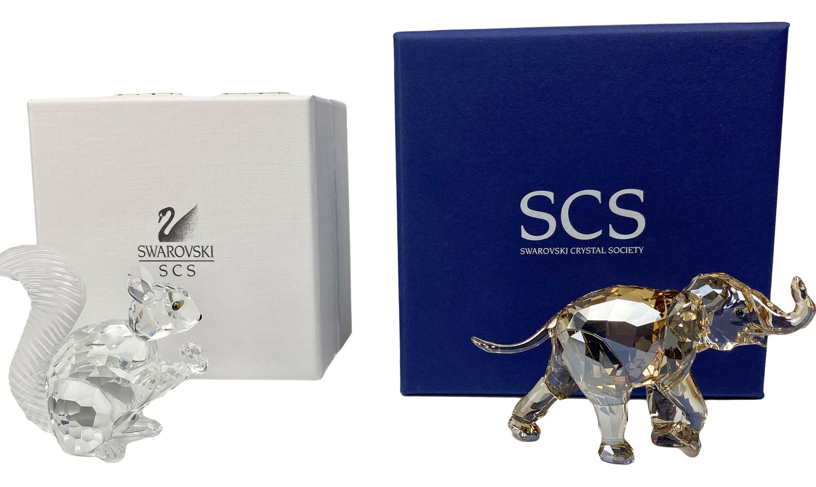 Swarovski Squirrel w Nut Elephant Figurine Box COA: Squirrel designed by Anton Hirzinger : Production years :1997 - 1997. Issued to celebrate the 10th anniversary of the SCS. Young Elephant designed by Elisabeth Adamer. Production years : 2013 - 2013. 