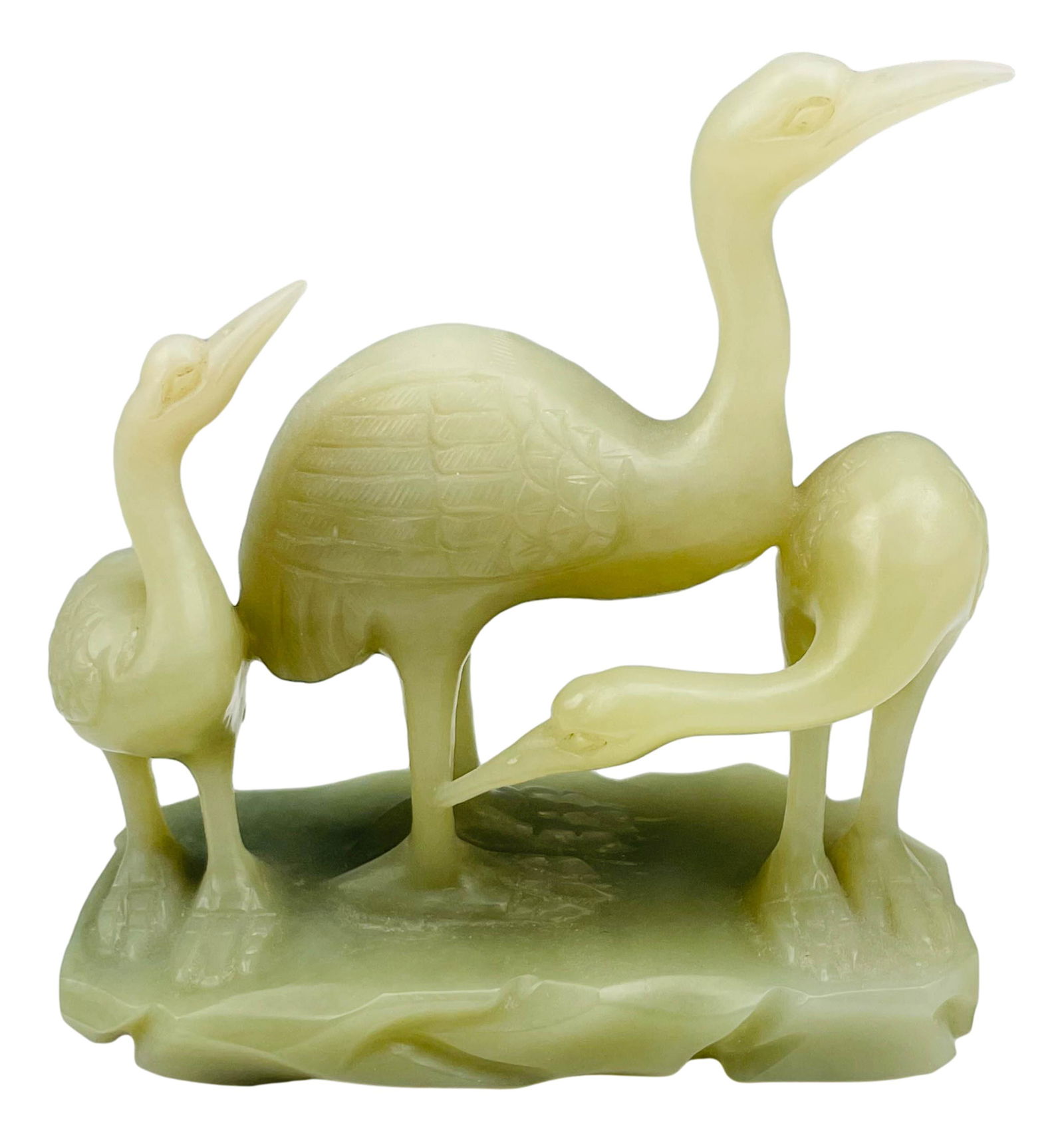 Chinese Celadon Jade Stork Crane Bird Sculpture: Subject matter features a stork crane bird grouping in marshland. Details seen on the wing areas. Smooth polished finish. Measures 3 3/4" x 3 1/2". No apparent markings. Condition: Good overall condit
