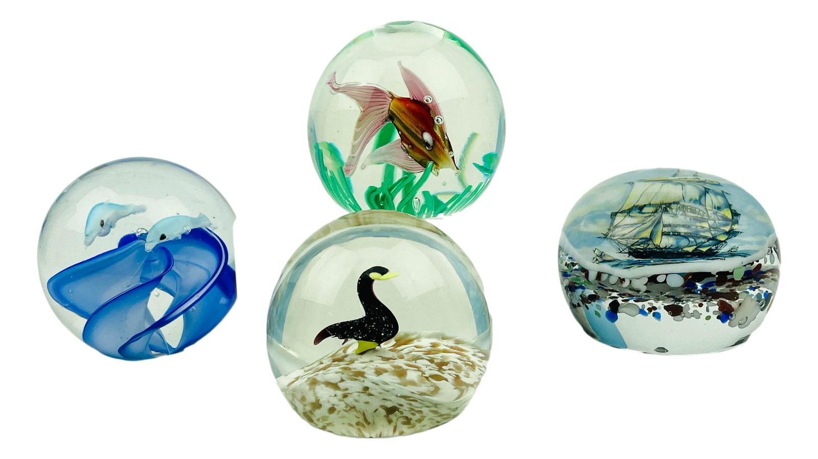 Paperweight Art Glass Estate Collection 4 pc LOT: Includes the following cased art glass paperweights ~ 1 x tropical fish, seaweed and controlled bubbles. 1 x loon duck bird on a white brown rocky base. 1 x dolphin fish and blue swirl. 1 x clipper sh