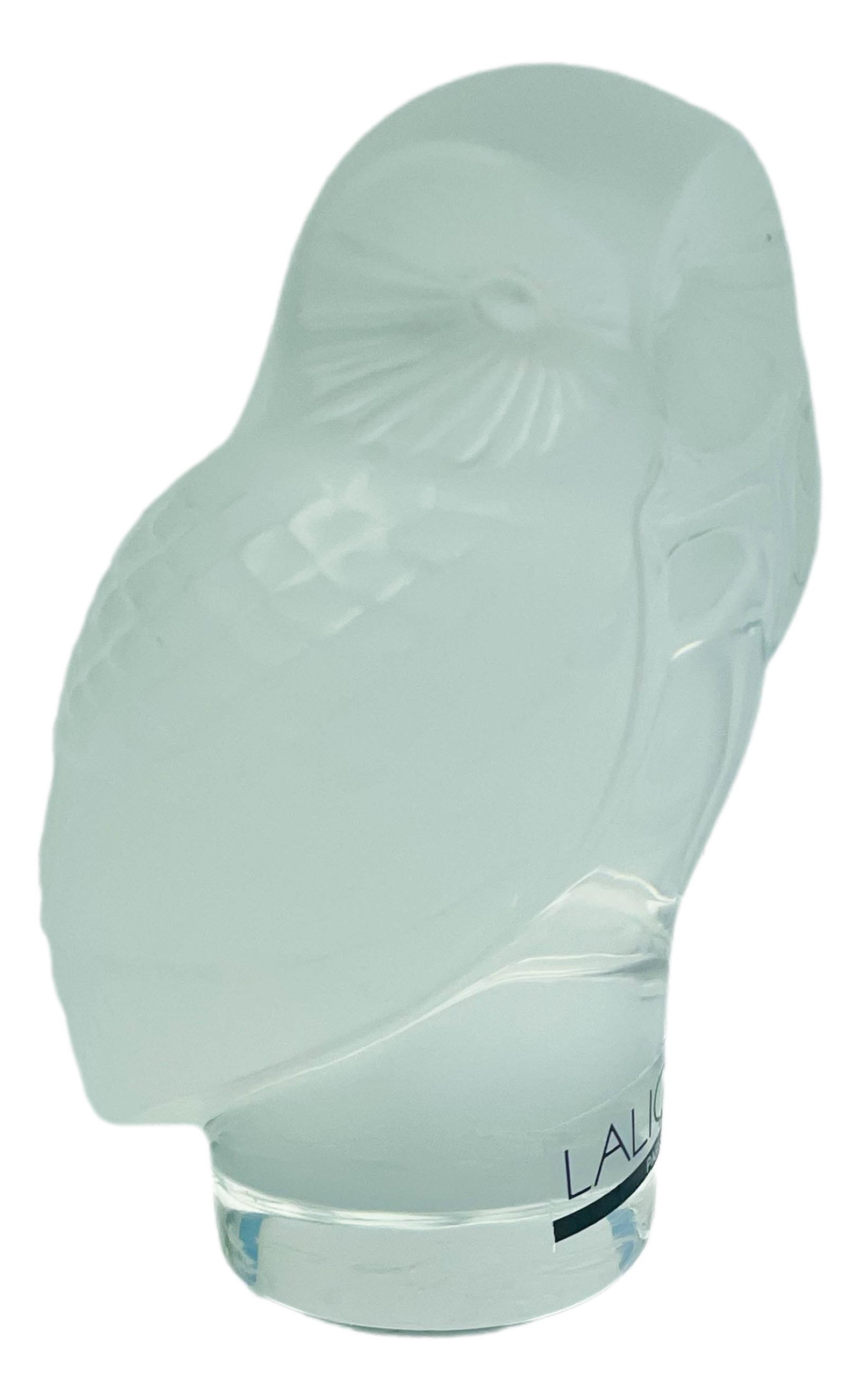 Lalique Frosted Crystal Owl Bird Glass Paperweight: 20th century French frosted crystal clear art glass "Hibou" owl bird desk paperweight. Signed in cursive script Lalique France. Also bears the original Lalique Paris sticker. Dimensions: 3.5 X 2.25 X 