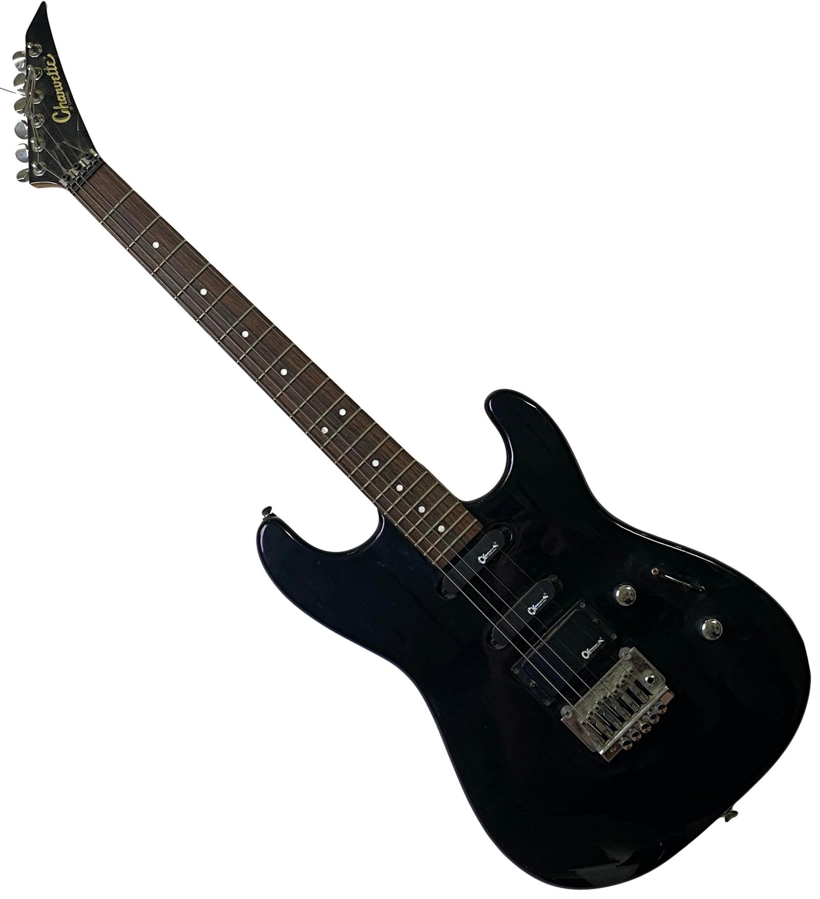 Charvette by Charvel Fender Style Electric Guitar: A late 20th Century Charvette by Charvel electric guitar. Serial # 010470. Features lightweight wood body and neck, with Fender style bridge, 22 frets, H.S.S. configuration pickups, volume and tone kn