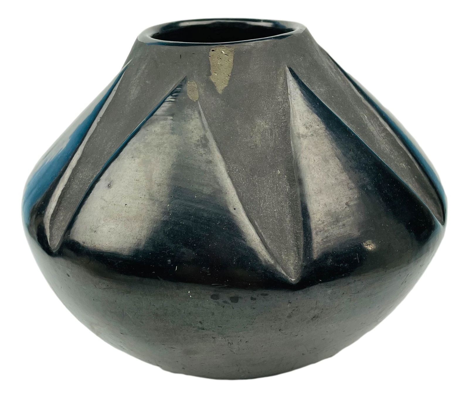 Isabel Martinez San Ildefonso Pottery Vase SIGNED: Isabel Martinez ~ San Ildefonso Pueblo Potter. This ovoid shaped blackware vase features carved saw tooth / mountain design around the body. Partial matte and partial polished finish. Measures 7" x 9"