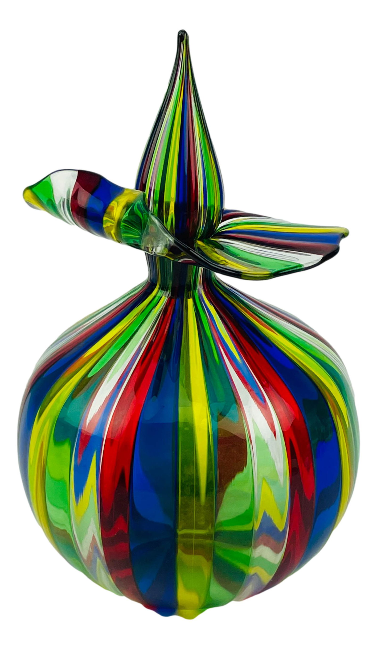 Millerighe Murano Glass Striped Bottle w/ Stopper: 20th century studio hand blown stoppered art glass bottle. Of simple rounded form with flared out ruffled rim mouth. Conical shaped stopper with dauber wand. Features a colored vertical striped that i