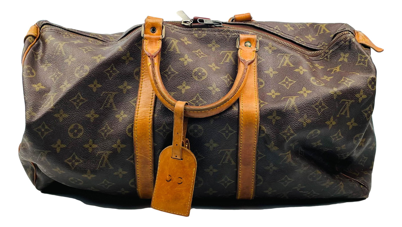 Louis Vuitton LV Luxury Travel Luggage Duffel Bag: A Louis Vuitton designer soft sided leather carry on duffel bag. Brown leather body with russet exterior accessories, and roomy single interior compartment. Double leather handle straps. LOUIS VUITTON