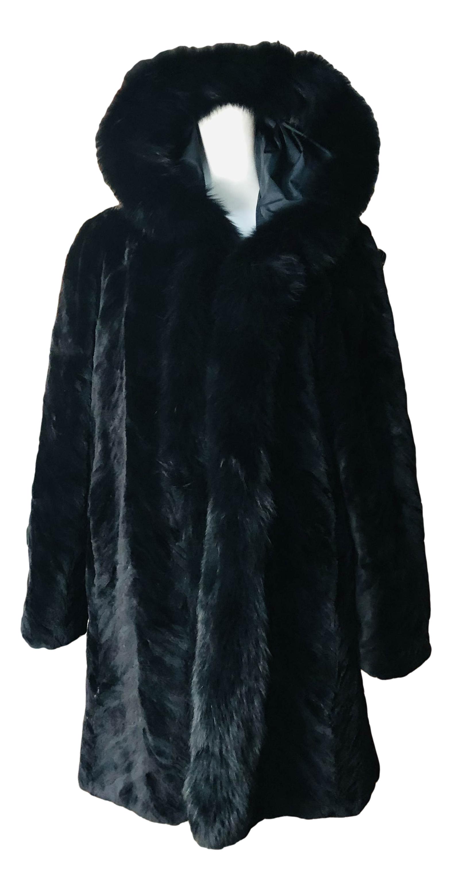 Black Sheared Mink & Fox Women's Large Fur Coat: Fur origin : Finland. Measurements as follows ~ Armpit to armpit ~ 25". Sleeve ~ 23 1/2". Shoulder ~ 18 1/2". Overall length 34 1/2". Signed ~ tags on the inside with text and relevant information. Co