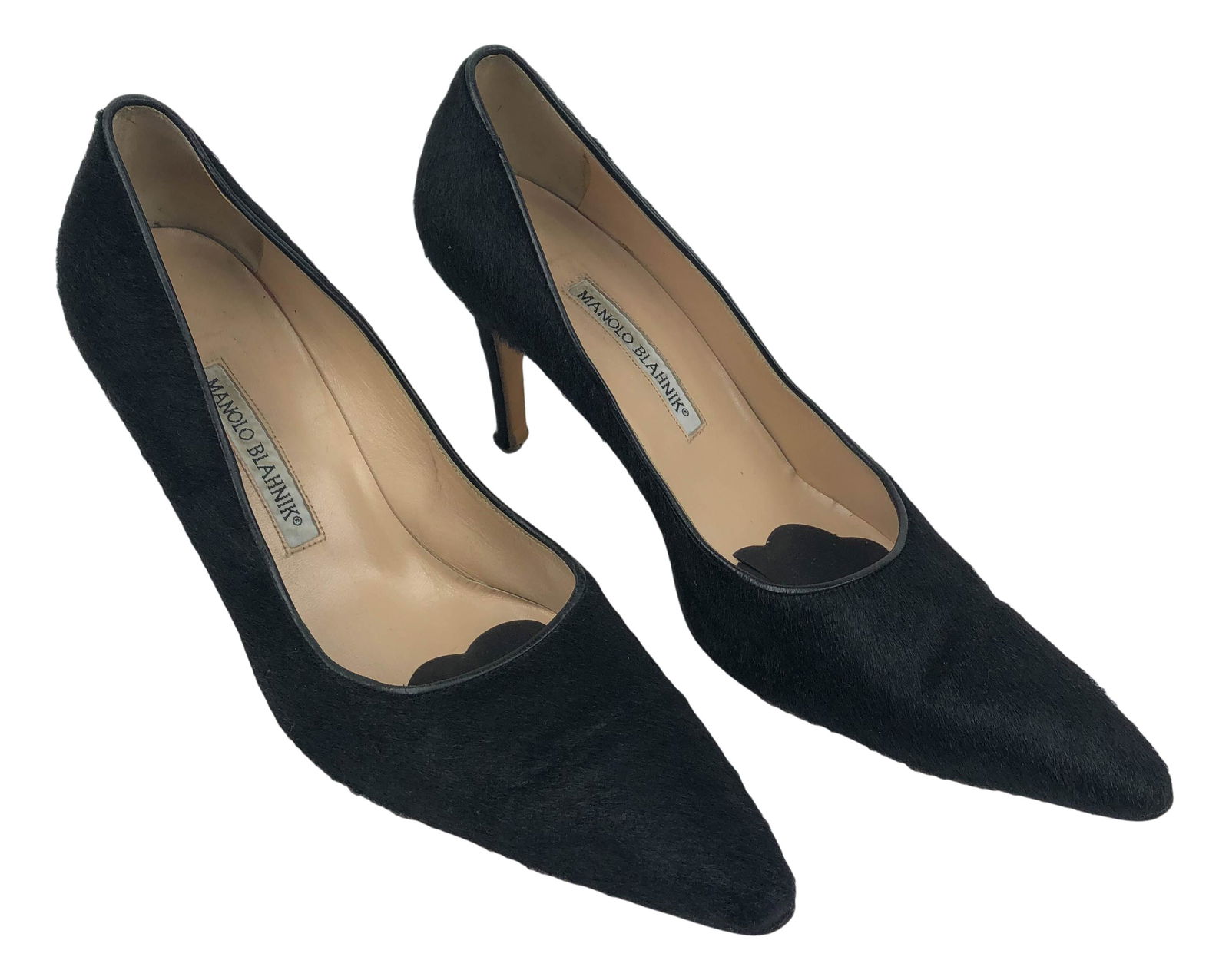 Manolo Blahnik Cowhide Pair Black 3.5" Heel Shoes: Manolo Blahnik, premier shoemaker and brand pair of cowhide heels. Shoes have black cowhide body and leather soles. Manufacturer label is inside of shoe and stamped on sole. Women's size 40. US size 9