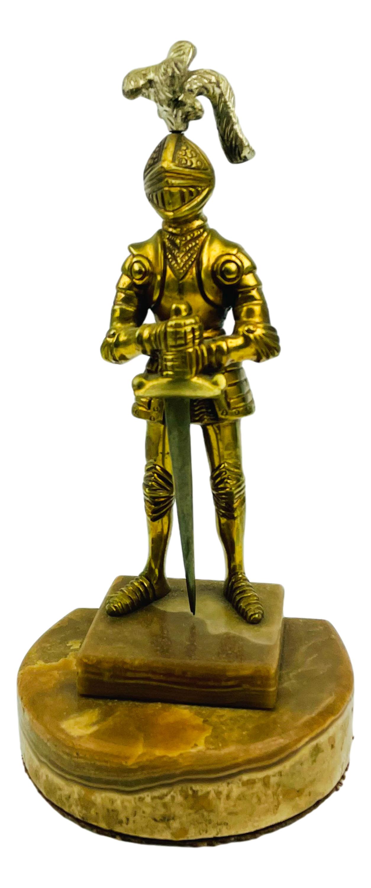 Bronze Medieval Knight in Armor Bookend Sculpture: Subject matter depicts a high middle ages metal sculpture of a knight dressed in plate armor wielding a sword. Mounted atop a square and 3/4 cut round marble base. No apparent markings. Dimensions: 9.