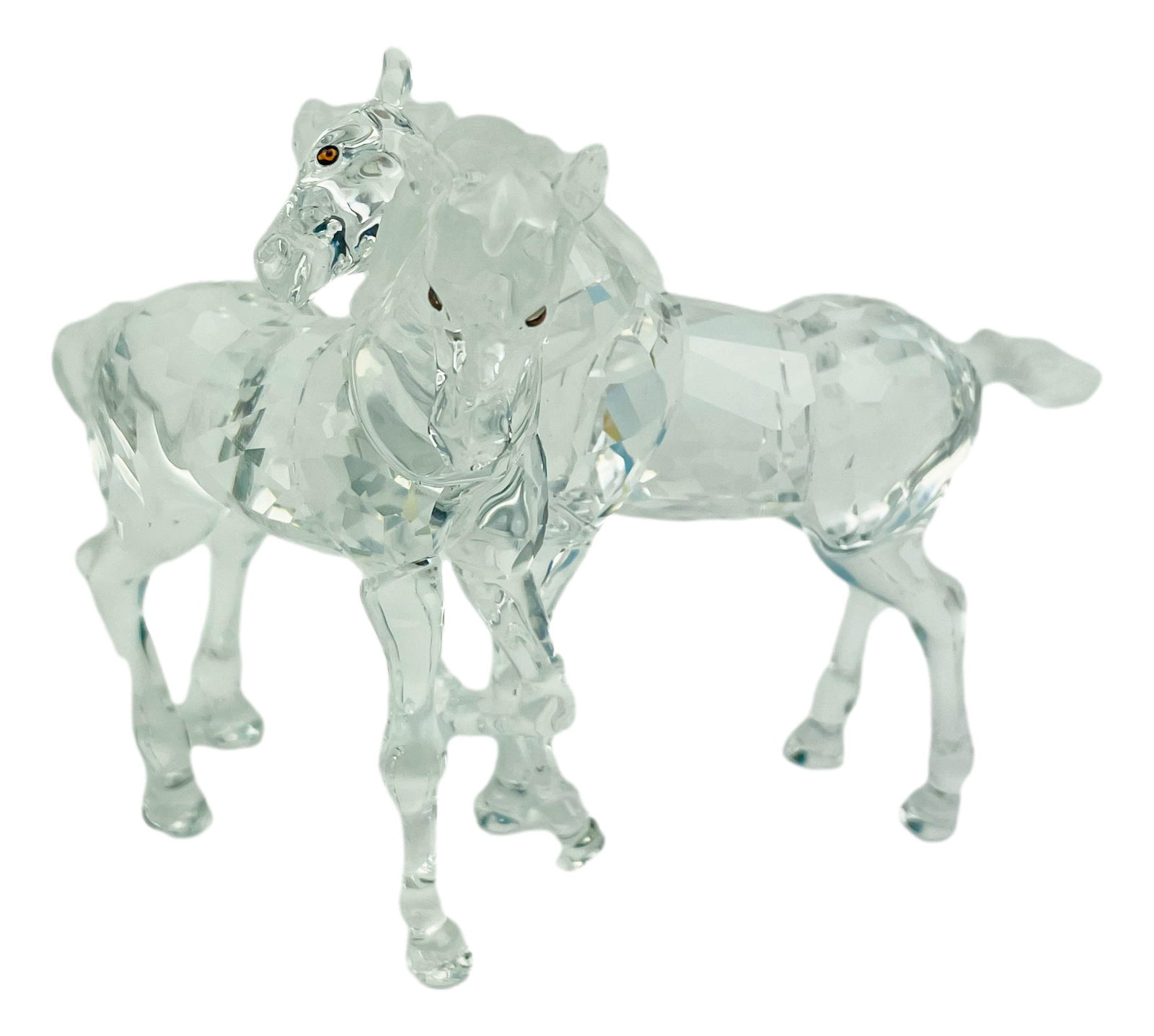 Swarovski Crystal Foals #7612 Horse Figurine w Box: Designed by Martin Zendron. Production years : 2003 - 2011. Part of the Peaceful Countryside group theme series. Modeled in faceted clear crystal with smoked topaz crystal eyes. Housed in its original