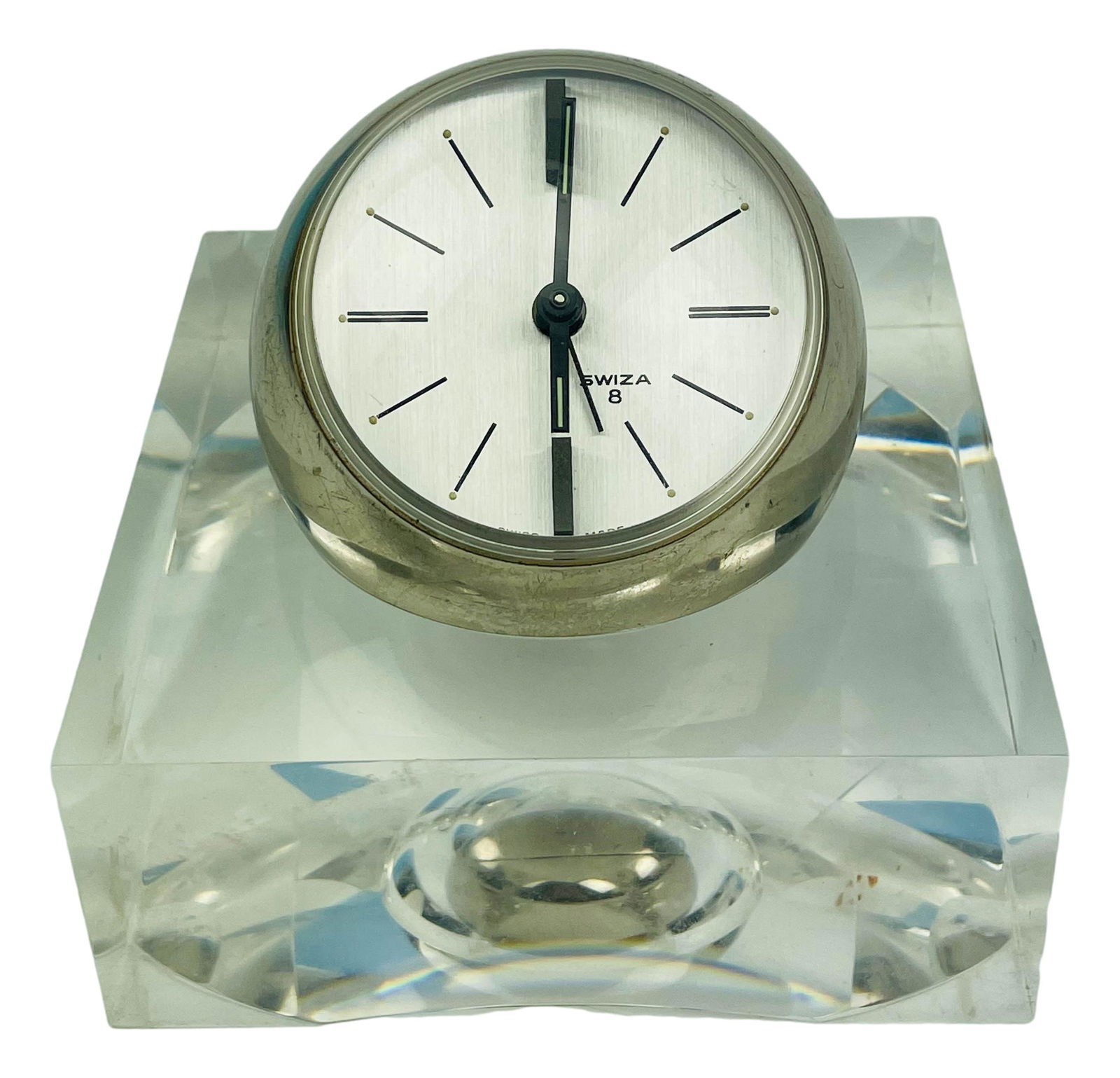 Swiza 8 Mid Century Modern Chrome Lucite Clock: Swiza 8 desk clock set in clear lucite base. Chrome eyeball clock. Marked on timepiece face Swiza 8. Back of clock is removable with settings and mechanisms inside. Marked inside Swiss made.Dimensions