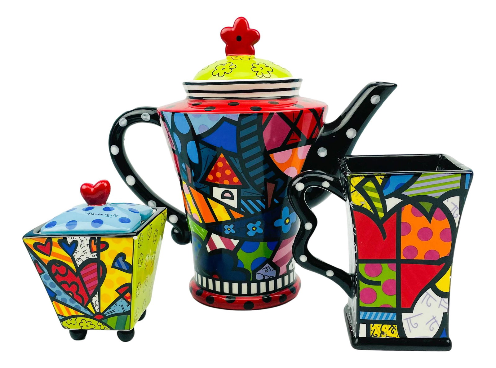 Romero Britto Pop Art Ceramic Teapot Creamer Sugar: Romero Britto ( Brazilian, 1963 ). Artist, painter, serigrapher and sculptor. His work is a combination of cubism, pop art and graffiti. Makes use of vibrant colors and bold patterns as a visual expre