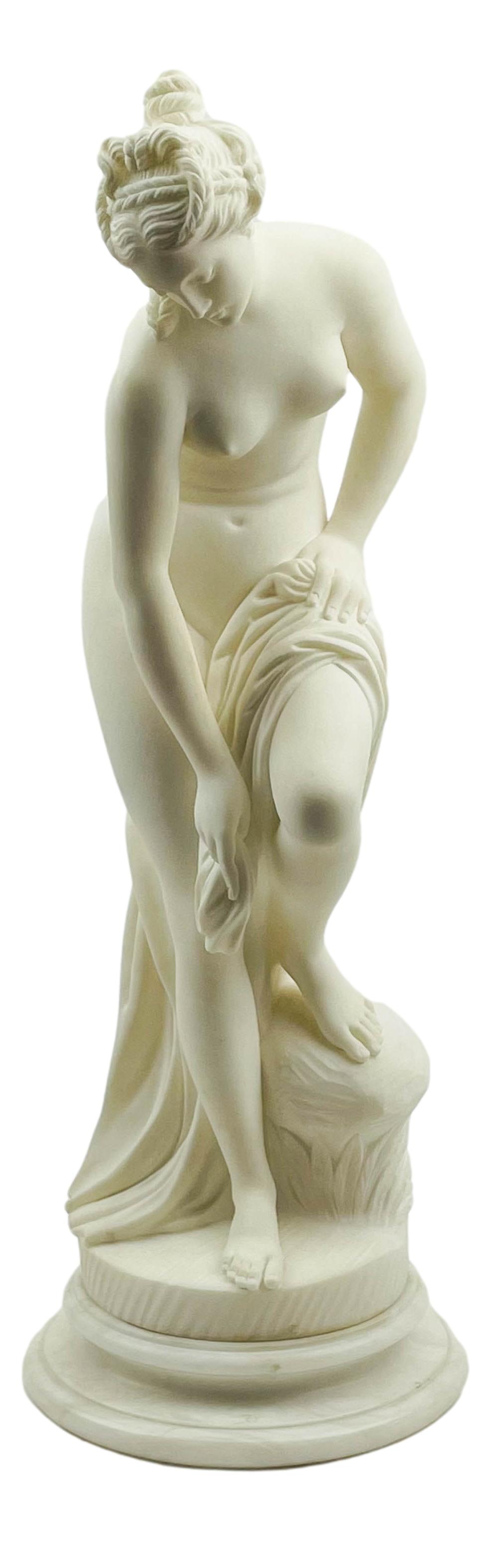 Venus at the Bath Neoclassical Marble Sculpture: 20th century hand carved white marble figural nude lady sculpture. Titled "Venus at the Bath" after the original 18th century by Christophe Gabriel Allegrain. Also referred to as "Bather". No apparent