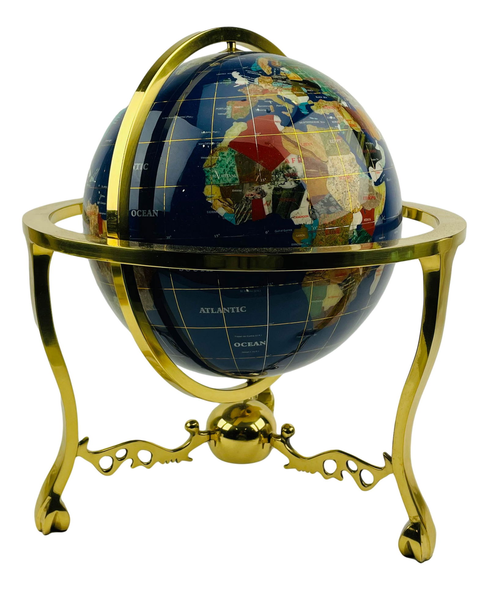 Blue Lapis w Inlaid Gemstone Rotating World Globe: 20th century stunning blue lapis world globe inlaid with Semi Precious gemstones including turquoise, shell, onyx, jade, marble amongst others. Mounted on a high polished brass tripod stand. Smooth ro