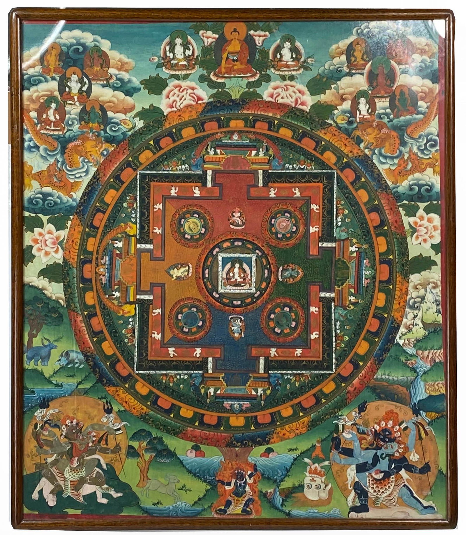 Tibetan Thangka Buddhist Deity Scroll Art Painting: 20th century article of Eastern Asian cultural art nicely presented in contemporary custom wood frame. Hand painted using traditional methods and depict various revered deities, dragons, cloud decorat