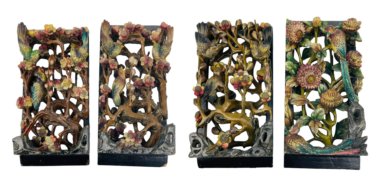 Chinese Temple Antique 4 Wood Panels Bird Motif: Chinese Temple antique wood panels. Estate lot of four carved panels with bird and flower motif. Panels depict various birds nesting and playing among the flowers. No apparent signature. Dimensions: 1