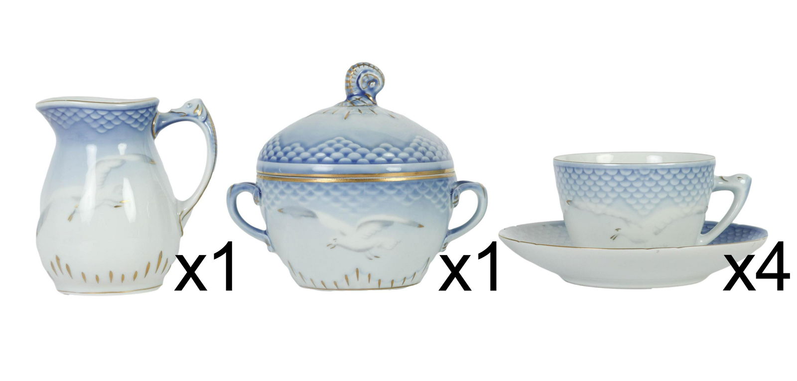 B&G Danish Seagull Cup & Saucer Cream & Sugar Set: Collection of six Bing and Grondahl Seagull patterned fine Danish porcelain tea cups, cream and sugar. Includes (1) 4.5" x 5.5 x 4.5 covered sugar, # 305, (1) 4.5" x 4" x 2.5" creamer, #303, and (4) 3