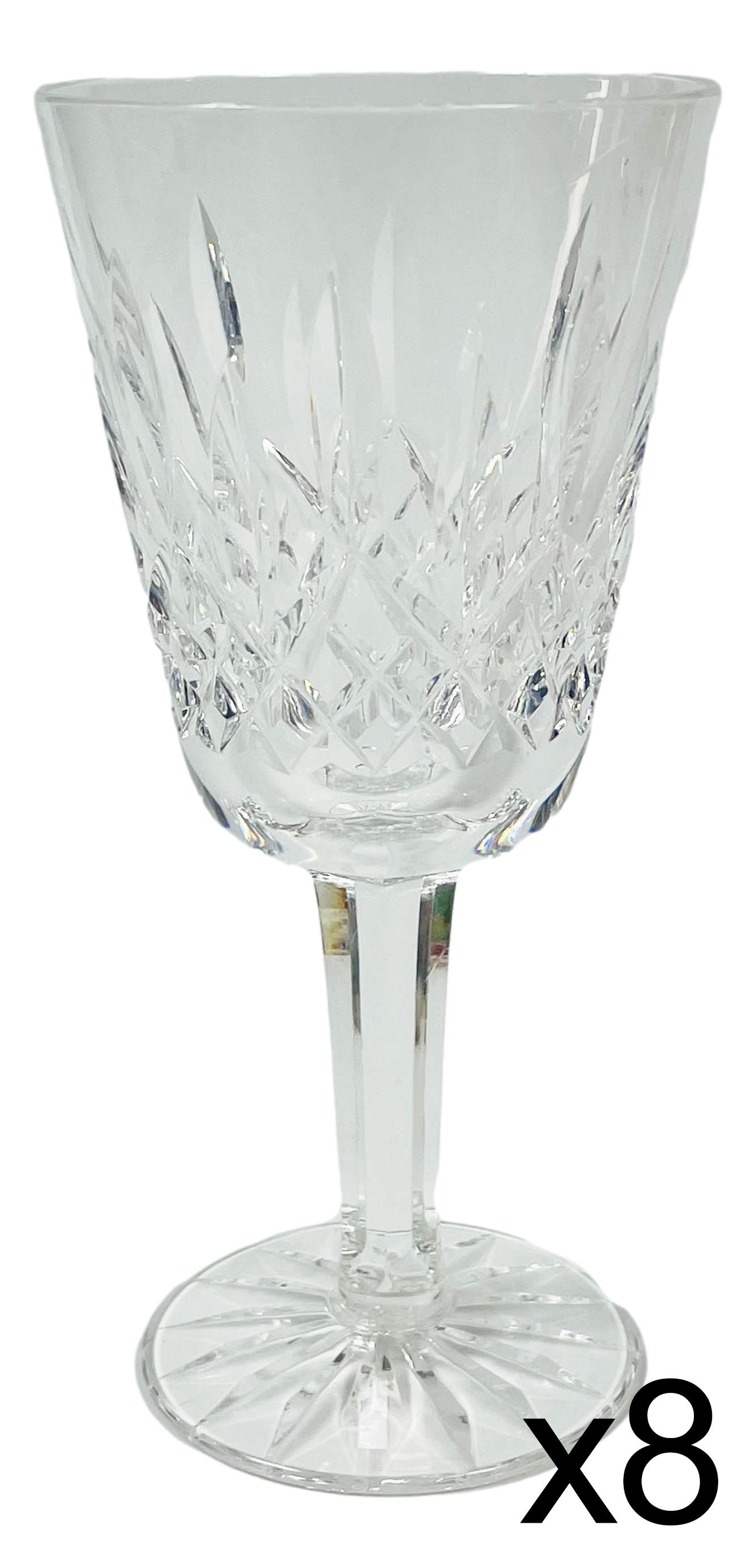 Waterford Crystal Lismore Claret Wine Goblet 8pc: Sparkling Irish crystal art glass champagne sherbets modeled by Waterford in their "Lismore" pattern that was introduced in 1952. Design features vertical cuts over a diamond quilt pattern. Multifacet