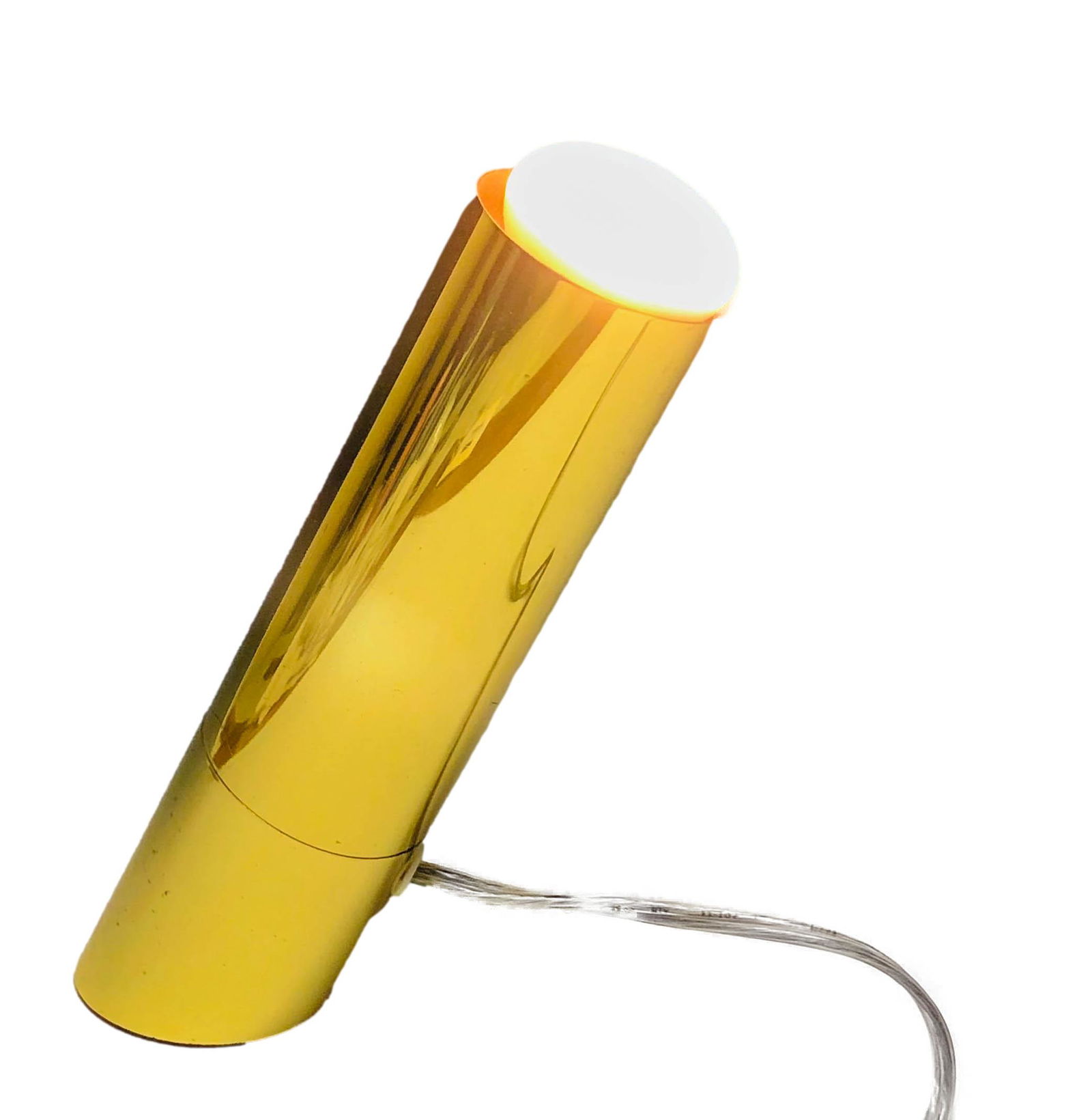 Brass Boulanger Style Mid Century Modern Lamp: Mid century modern brass lamp. Gilt finish over brass. Single light source. Diagonally cut base to create a leaning appearance. Original 1970s cording with off/on switch. No apparent signature. WorksD