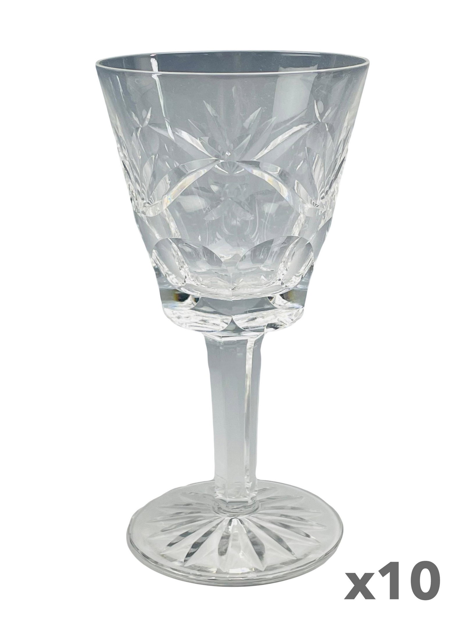 10 Waterford Crystal Ashling Claret Wine Goblets: Set of 10 Irish cut crystal bar barware art glass stemware modeled by Waterford in their "Ashling" pattern. Production Years : 1968 - 2017. Design features cut fans, coin dot, leaf shapes and oval con
