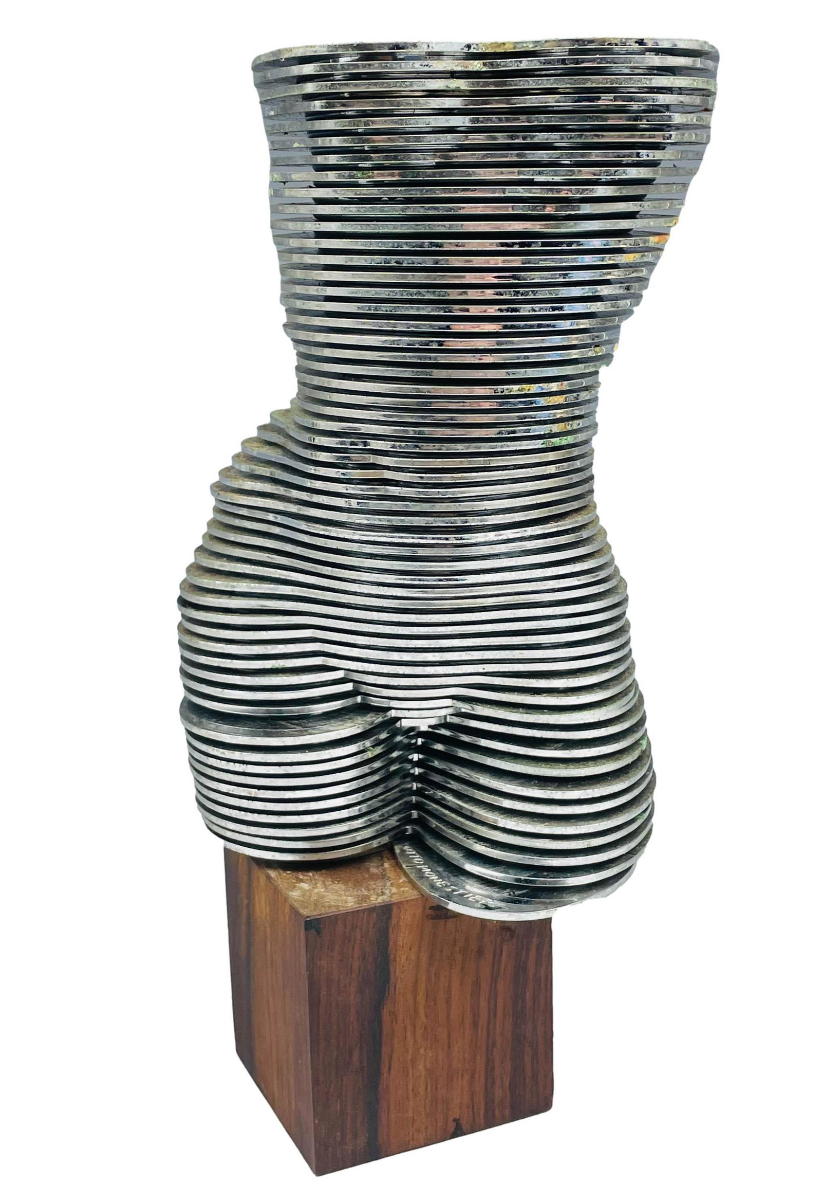 Otto Monestier 1918-1977 Kinetic Nude Sculpture: Otto Monestier (Italian, 1918-1977). Titled "Eva", sculpture of chromed plastic discs set on wood plinth. Bust of woman is characterized by 55 discs that rotate around a central axis fixed on a cube s
