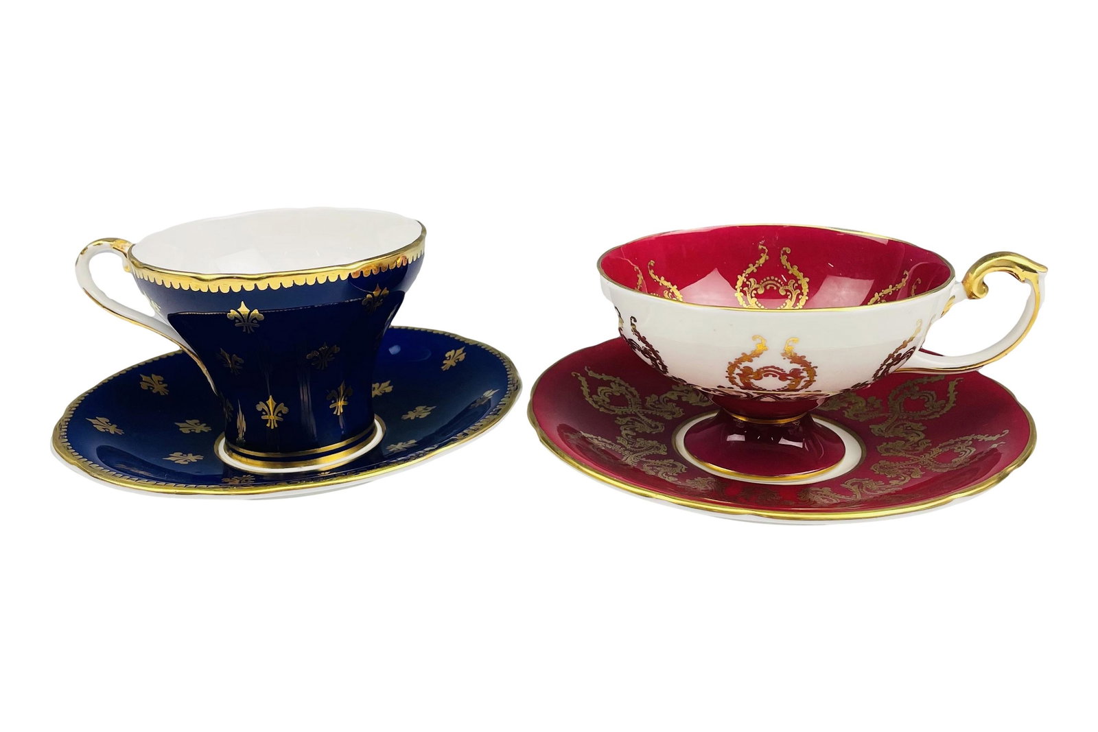 Aynsley English Bone China Cups & Saucers 2pc SET: Two English cups and saucers by Aynsley. Crafted of fine quality English bone china porcelain. Lot includes maroon floral cup and saucer, # 1543, and cobalt blue and gold #C1022. Both signed with gree