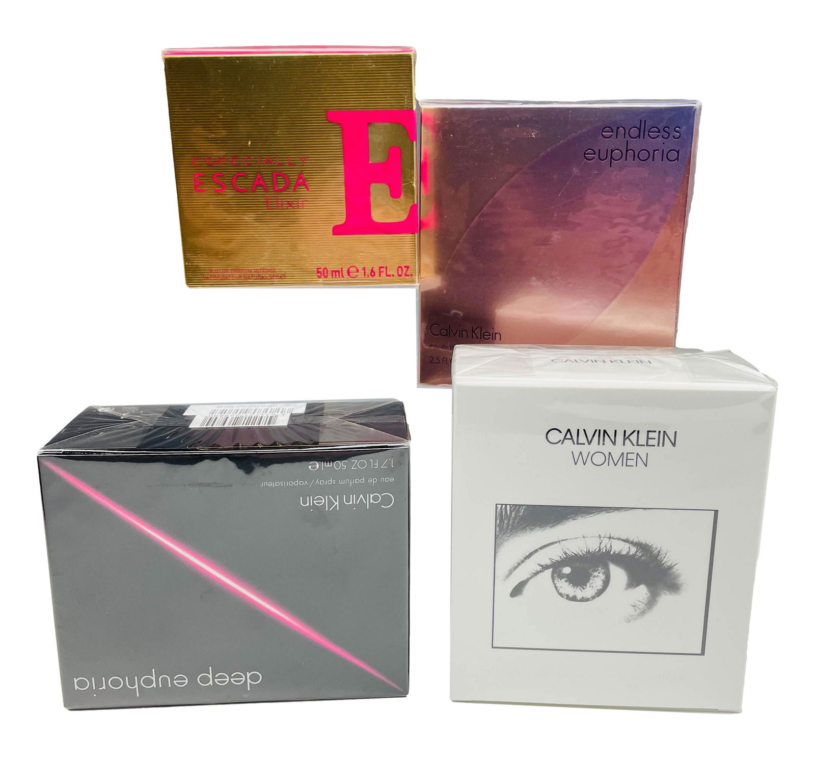 Calvin Klein New Designer Perfume 4pc ESTATE LOT: Estate collection of never opened perfumes by Calvin Klein. Lot includes: (1) 2.5 oz Endless Euphoria, (1) 1.7 oz Deep Euphoria, (1) 1.7 oz Woman, (1) 1.6 Especially Escada. All new eau de parfum spra