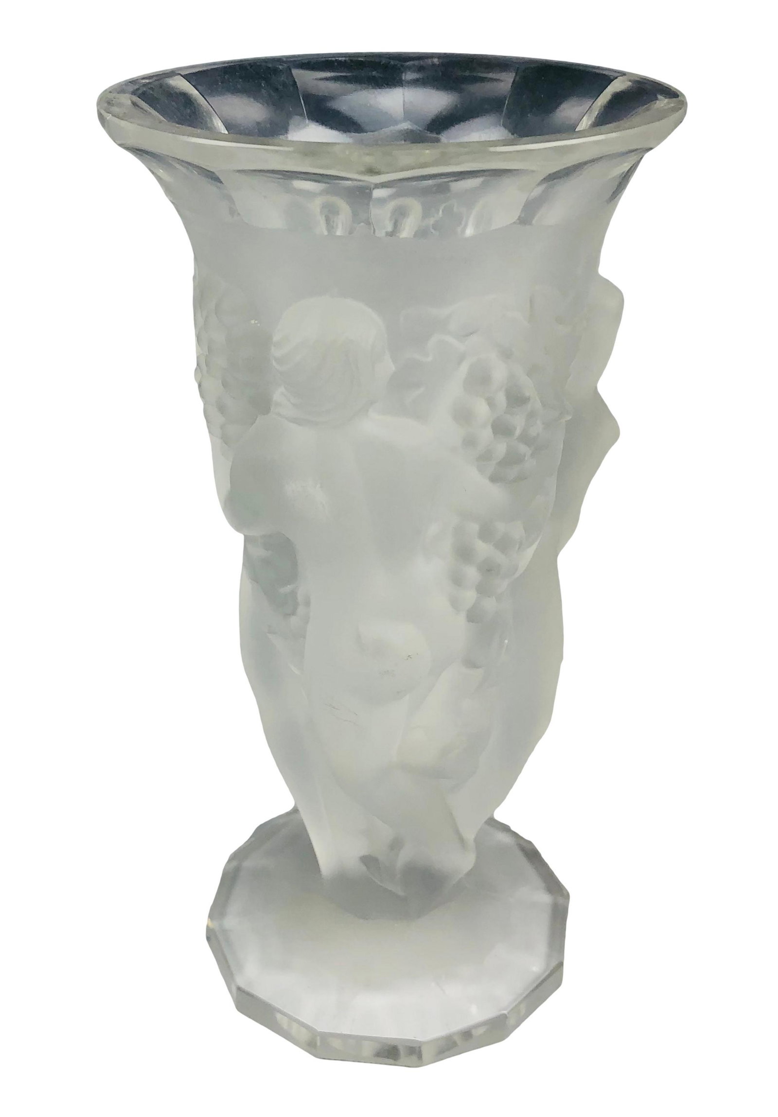 Halama Czech Bacchantes Nude Female 9" Glass Vase: Halama Czechoslovakian Art Deco style crystal vase. Features frosted nude women dancing around vase, with clear glass top and bottom. Titled "Les Bacchantes Muses". Dimensions: 9 X 5 X 5 in. Condition