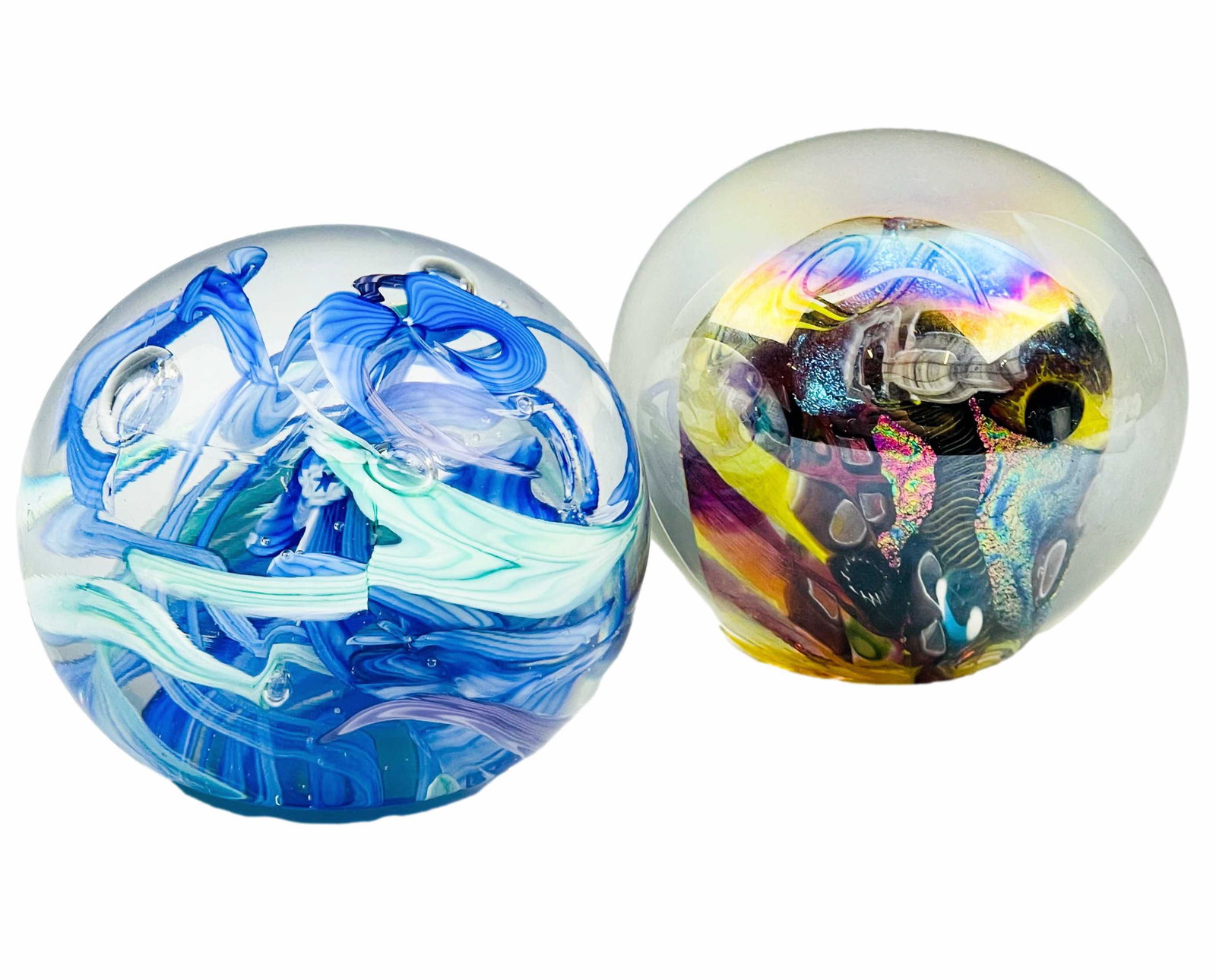 Mystery Artist Swirl Iridescent Paperweight 2p LOT: Includes 2 studio handcrafted hand blown desk paperweights. One features a blue and green swirl ribbon pattern with varying sized controlled bubbles, the other with a multi colored mass form, trailing
