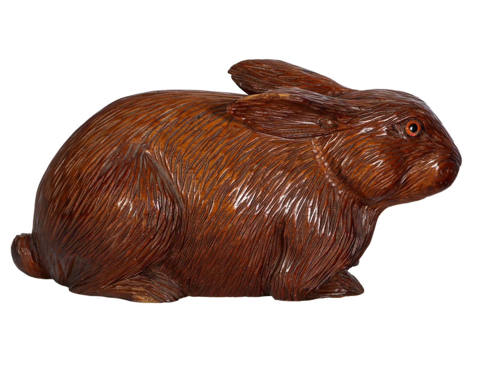 Wood Carved Glass Eyed Rabbit Korea Pre 1945: Wood carved glass eyed rabbit. Made in Korea pre-1945. Highly detailed carving in wood. Natural finish. Glass eyes add to detail. Base of rabbit has three stamps covering inspections and export of ite