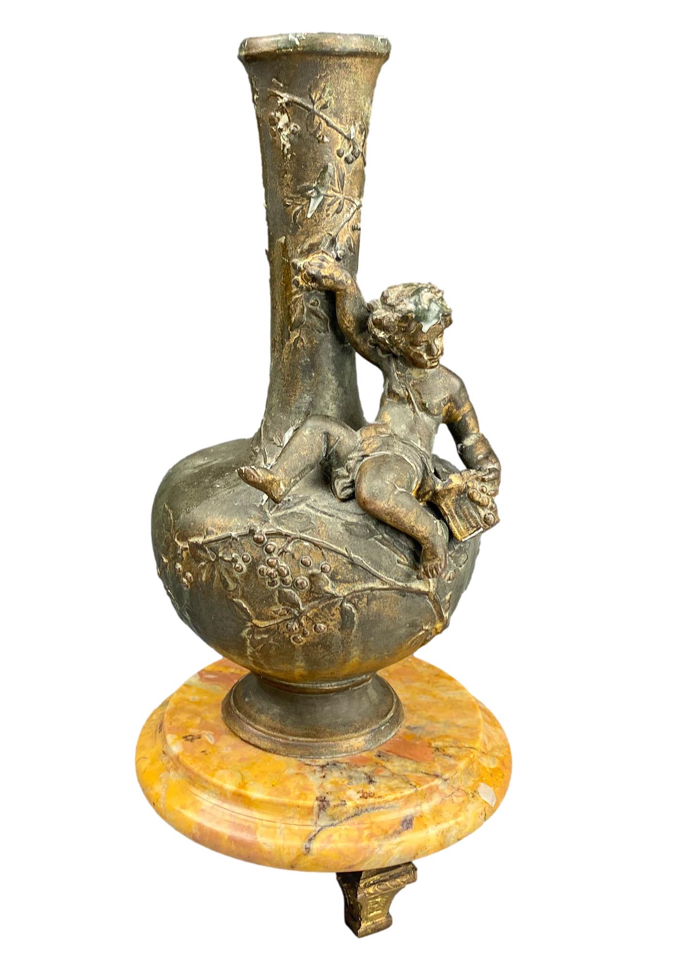 Antique Bronze Type Nude Cherub Vase Marble Base: Early 20th century Art Nouveau gilt spelter shelf mantle vase. Features the legendary and mythological nude cherub seated on the shoulder area on one side against a raised floral relief decoration. Mo