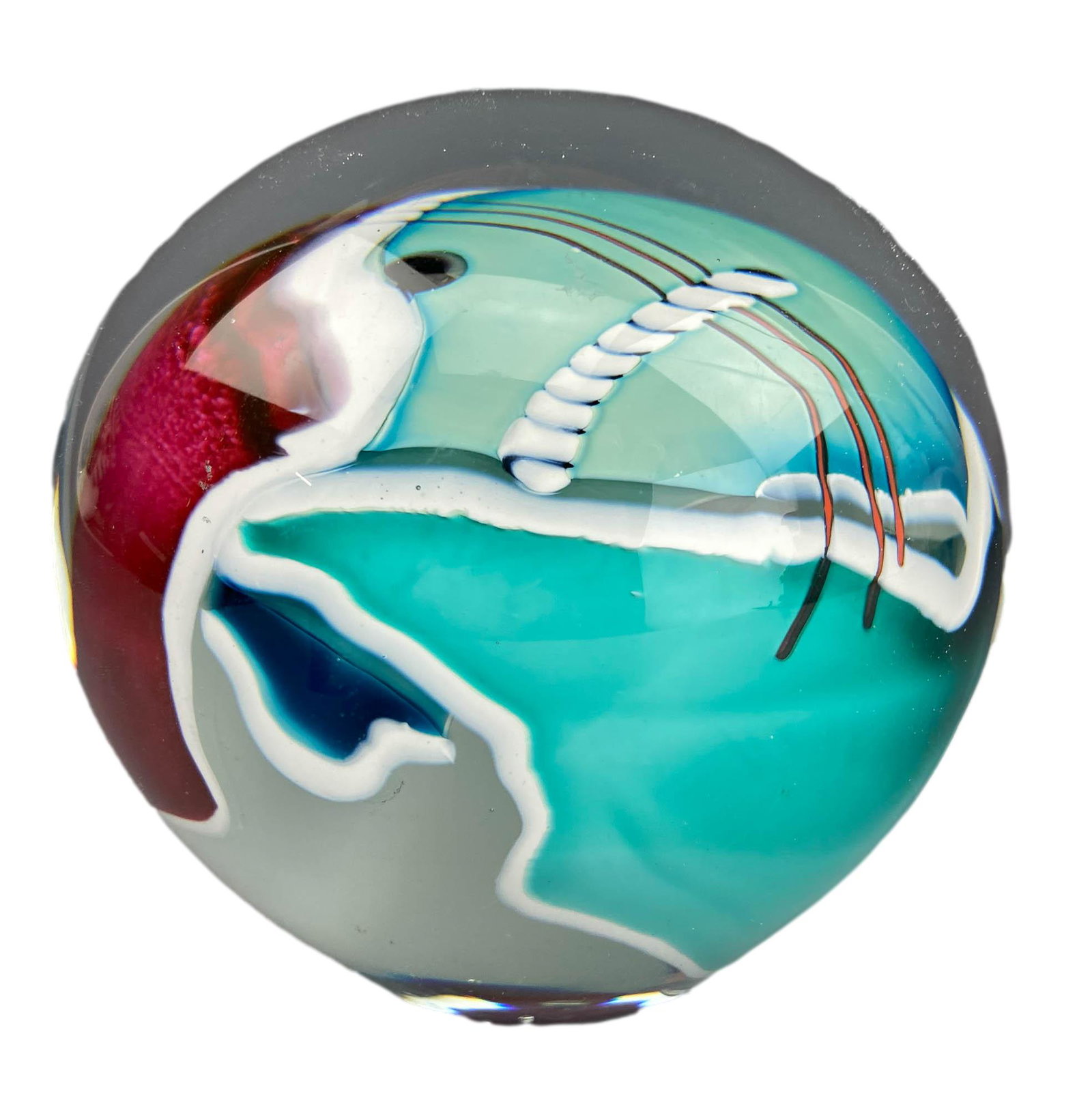 James Wilbat Blown Abstract Art Glass Paperweight: James Wilbat ( American, 20th century ). Design showcases a colorful abstract design, the entire composition encased in clear liquid molten crystal. Signed James Wilbat '93. Dimensions: 4.5 X 4.25 X 4