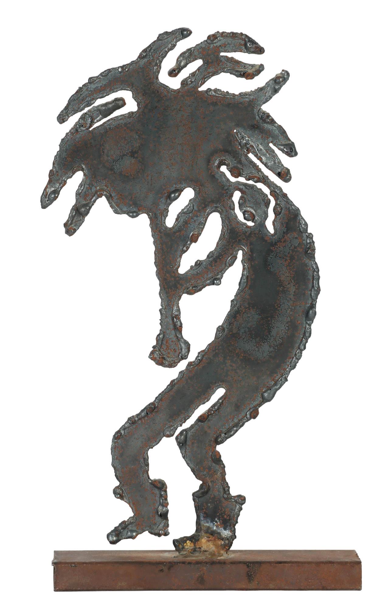 Welded Brutalist Kokopeli Figure Mystery Artist: Welded iron brutalist Kokopeli figure with attached stand. Edges left rough and with excess melted iron. Naturally forming rust seen throughout. Initial "H" or "I" to bottom. Dimensions: 12.5 X 7 X 1.