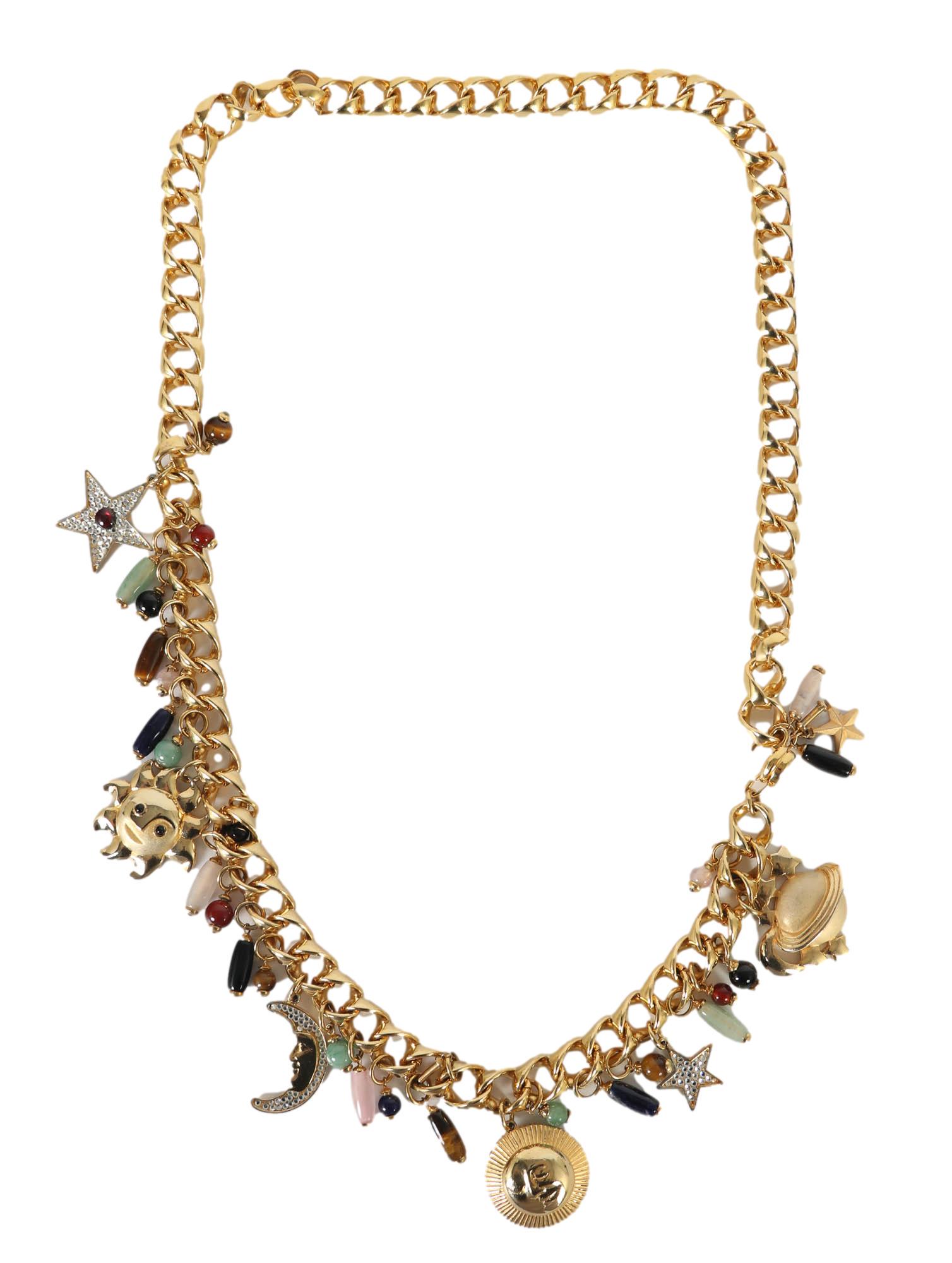 Judith Leiber Bejeweled Gold Tone Charm Link Belt: Luxury designer women's belt by fashion designer and businesswoman Judith Leiber ( Hungarian, American, 1921 - 2018 ). Showcases several suspended charms, some with rhinestones, some with semiprecious